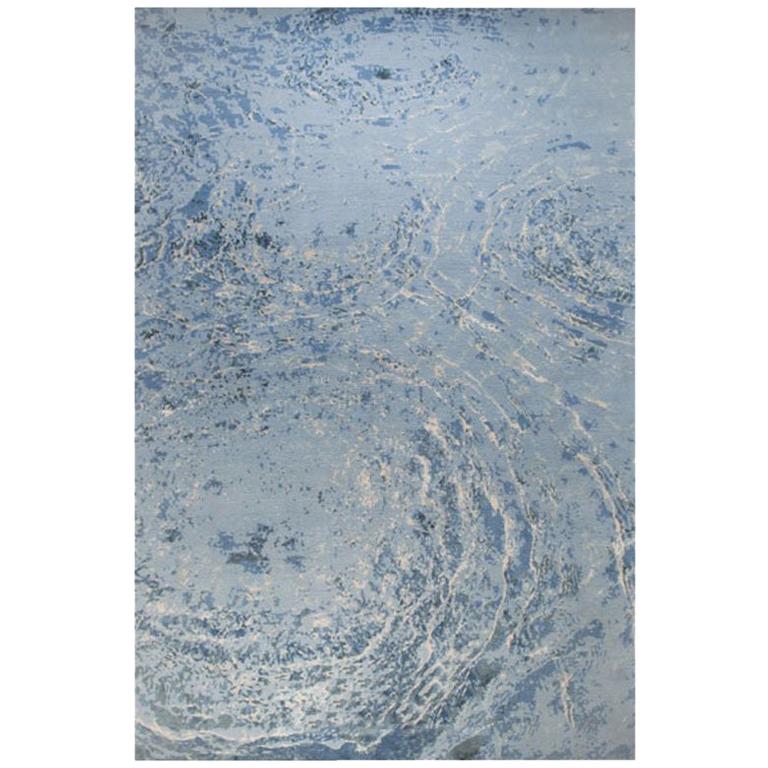 Alfombra contemporánea moderna en azul, hecha a mano de seda y lana, "Océanos"