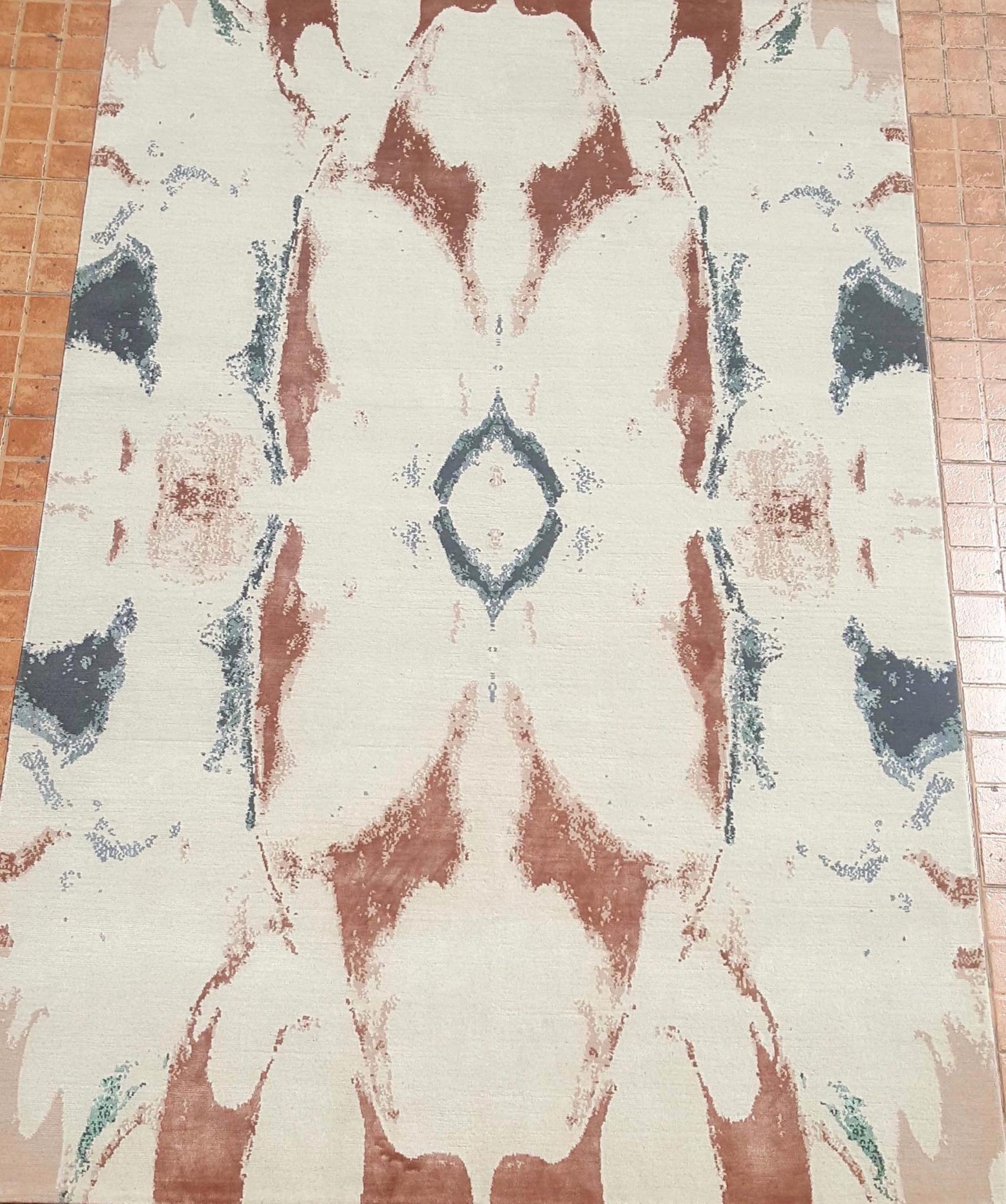 Rich in tonal depth and shading the design is drawn from an original watercolor brushstrokes painting created by the designer. Drift rug is artistic and abstract and offers a play of subtle color transition, merged together and blended in wool and