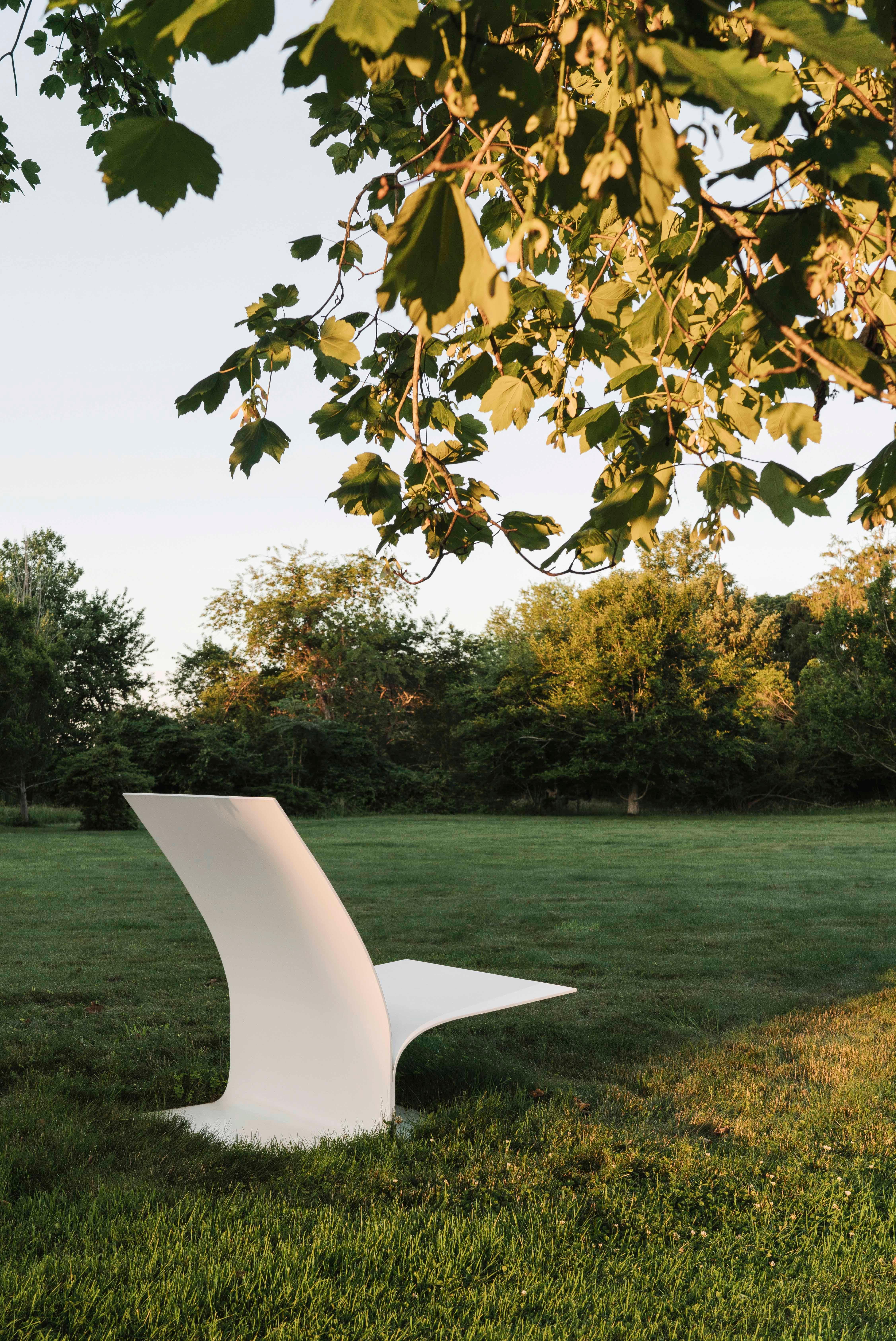 Bird Chair's abstracted bird profile carries connotations of flight; in side view, the biophilic outdoor loveseat resembles a bird in flight. It provides a sculptural focus point for the garden, encouraging indoor/outdoor living. This aluminum