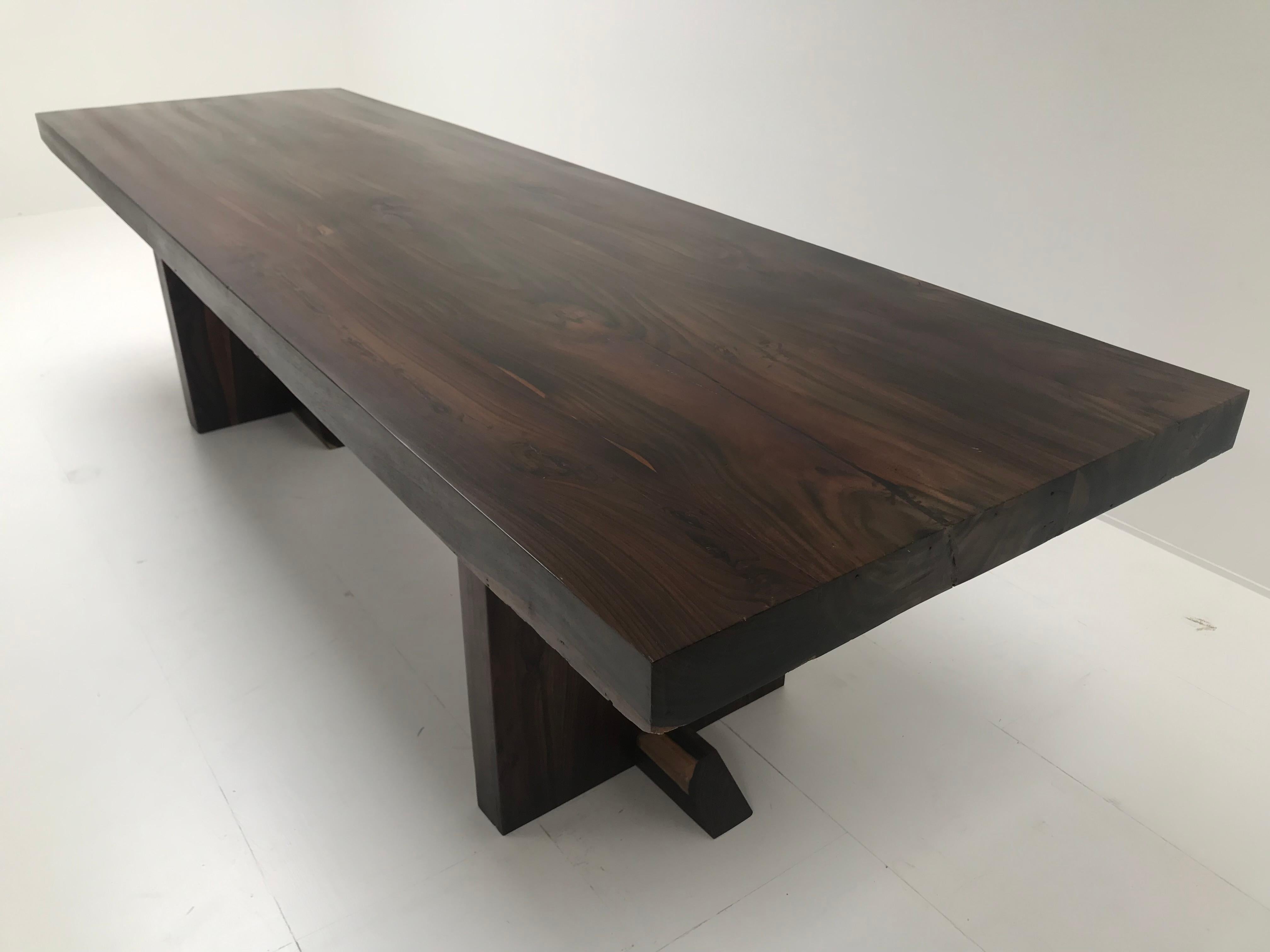 Exceptional Modern Table in a Polished Beechwood,wooden square feet,

great shine of the wood, very simple but powerful design,

Can be used as a dining table or as a writing desk.