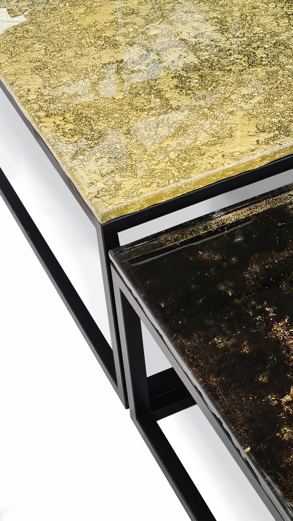 Contemporary and modern square coffee tables made of Murano kind handmade glass colored using metal oxides  and liquid metal in gold and black color. Limited collection signed by Edith Baranska showed for the first time in 2020. The artist received