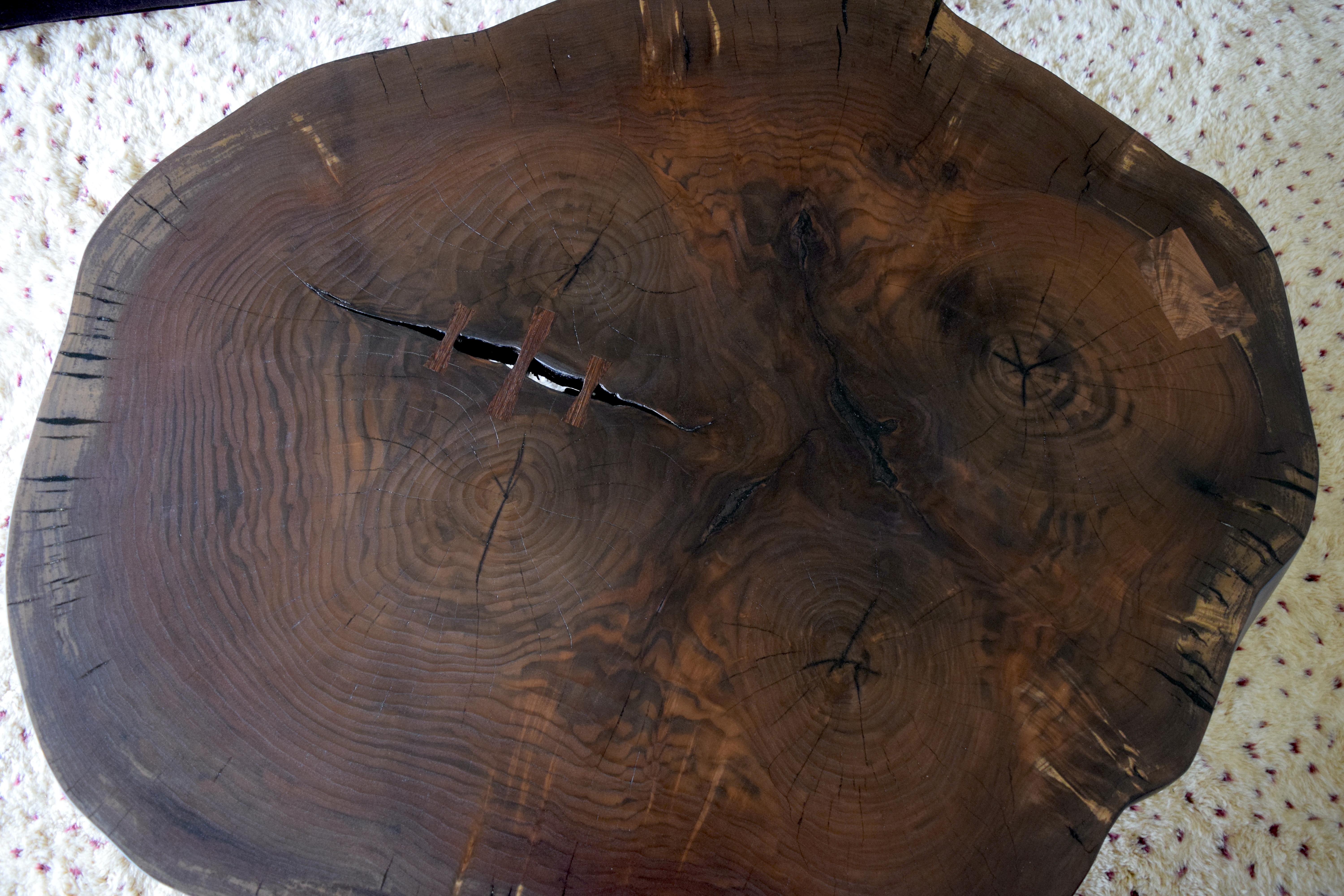 This is an example of a custom slab coffee table commissioned and built for a designer. Each table is unique and custom, as each slab is unique, so please inquire if you have any questions or specific requests. This table features a thick cookie