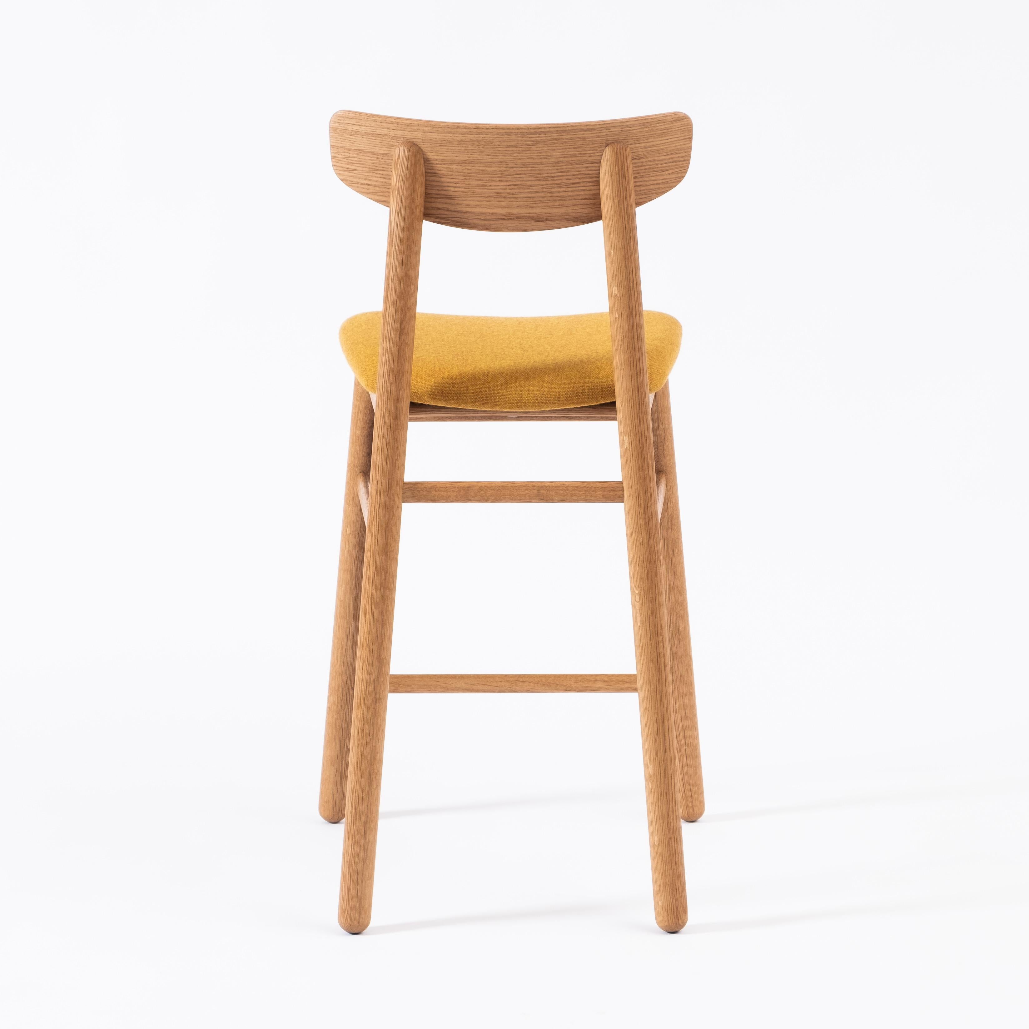The Baton stool is a refined counter-height stool that blends a clean Mid-Century inspired aesthetic with traditional materials and joinery techniques. Each piece is handcrafted to order in our Ottawa studio.

The Baton is built using mortise and