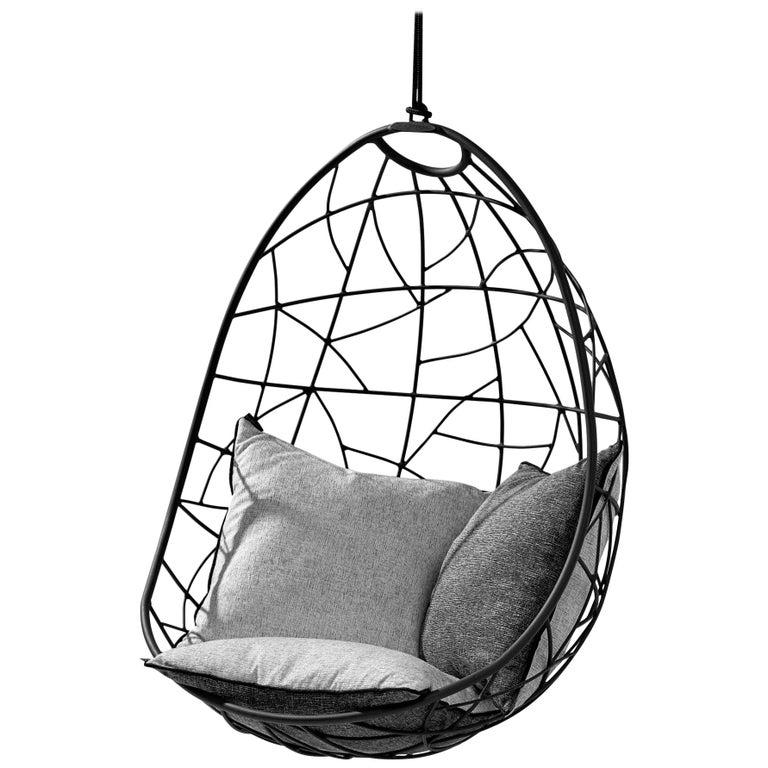 The Nest Egg hanging chair swing seat is inspired from the organic forms in birds' nests and has a natural egg shape. The chair has been designed to be extremely comfortable and has a cozy cocoon-like feel. It will embrace your body with its