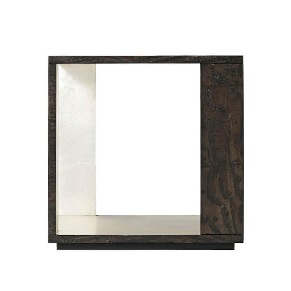 Modern open cube side table with black open grain Tamo ash veneer and silver leaf interior.
Dimensions: 18