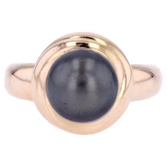 Anello moderno con perla grigia coltivata in oro giallo 18 carati