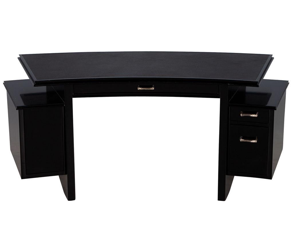 Modern curved black leather writing desk by Nancy Corzine Fusion Desk. Original Nancy Corzine fusion desk, masterfully restored in a polished high gloss black lacquer finish with Italian black leather top. All original hardware. This iconic curved