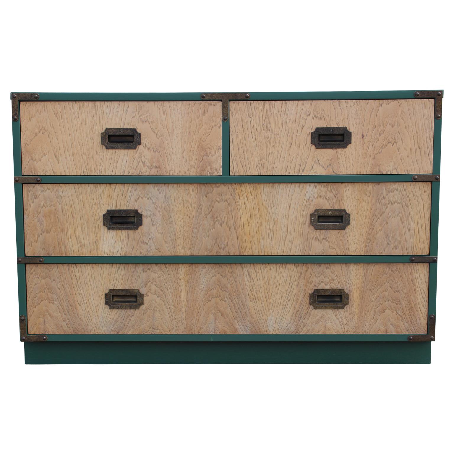 Modern custom finish and green lacquer four-drawer dresser/chest of drawers with brass detailing.