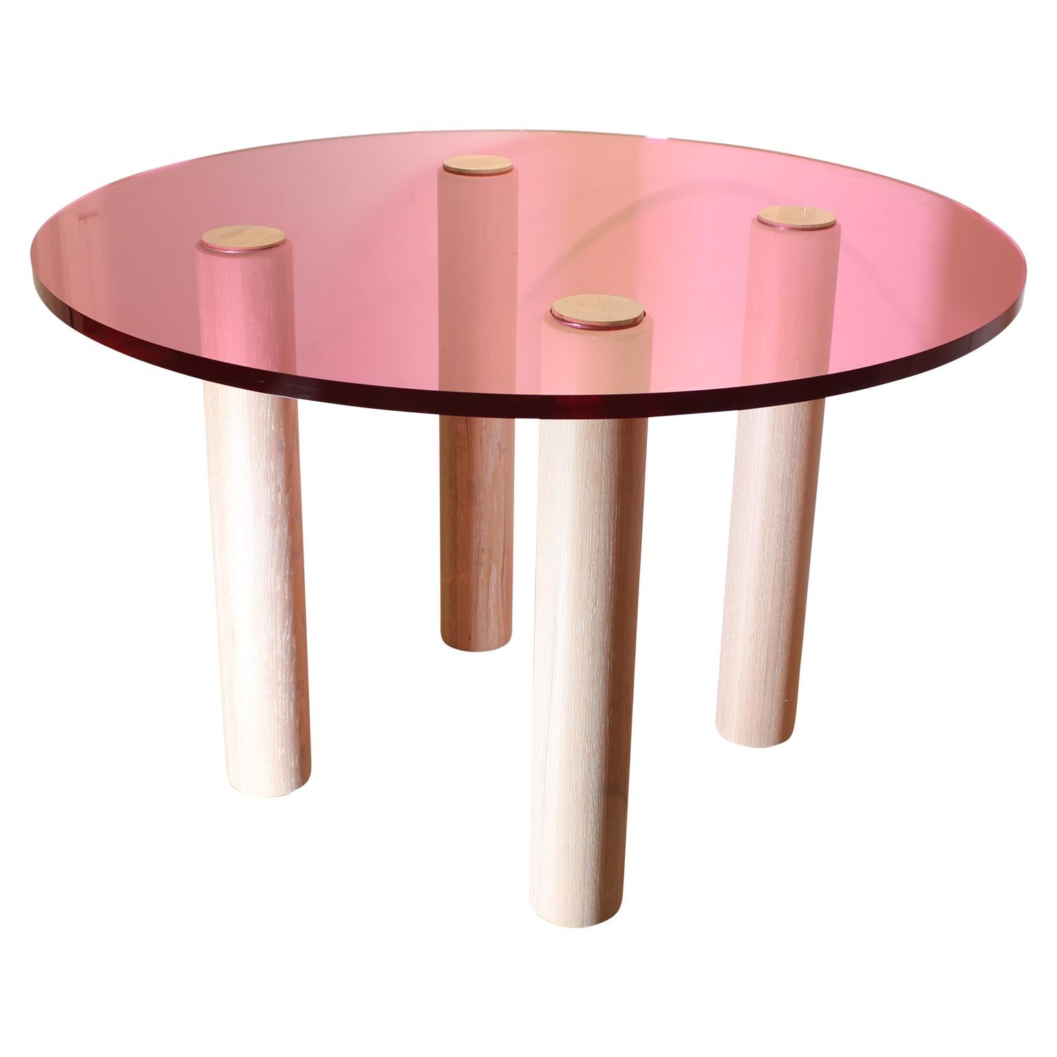 Custom pink Lucite table in a modern style. The four legs are white oak with a white cerused finish. We can custom make other size and colored Lucite tables. For more details message us.
Another example of Reeves Art & Design custom tables is