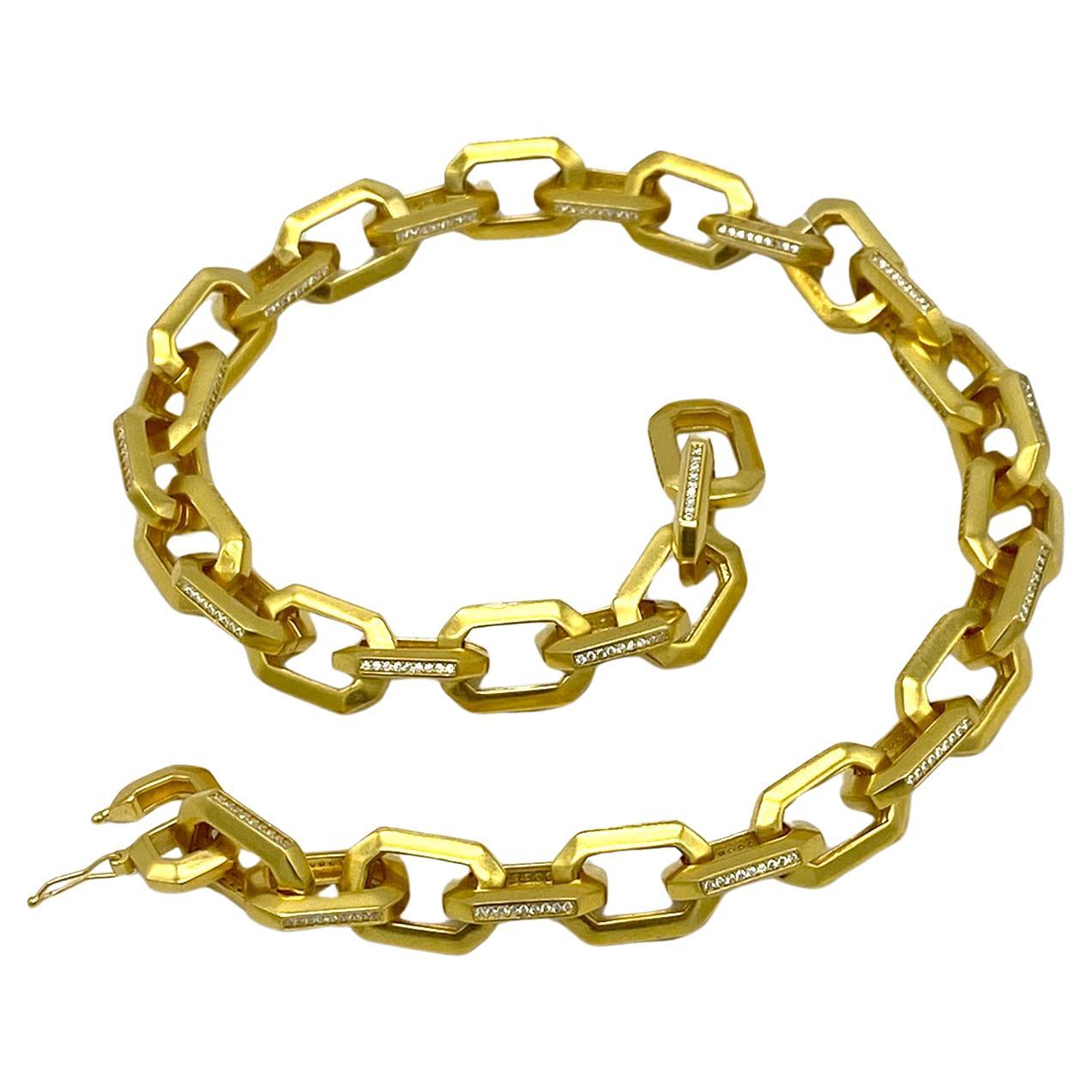 This is a new CZ on gold chain necklace. This necklace has heavy gold plated 0.75 x 0.5 large chain decorated with CZ on the sides of the links. Looks very 80s modern style. See our similar style bracelet sold separately.

Our vintage jewelry