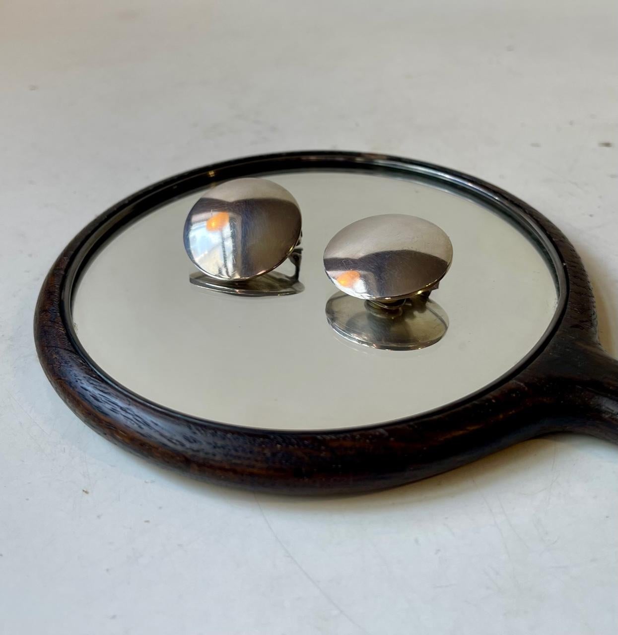 Sølvsmedien i Kolding, Denmark is closely related to Hans Hansen Silversmithy and accordingly Georg Jensen who took over the company during the 1980s. These XL (30mm) disc/ufo shaped ear clips were made circa 1980 and is hand made from 925 sterling