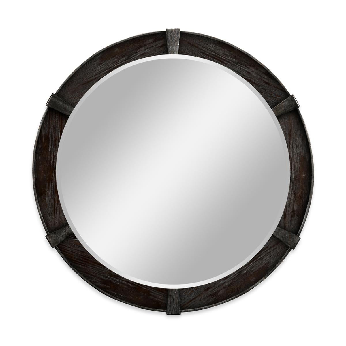 Modern Dark Ale round mirror, the small circular mirror in a dark finish with contemporary relief carved detail and a plain beveled mirror glass.

Dimensions: 35 7/8