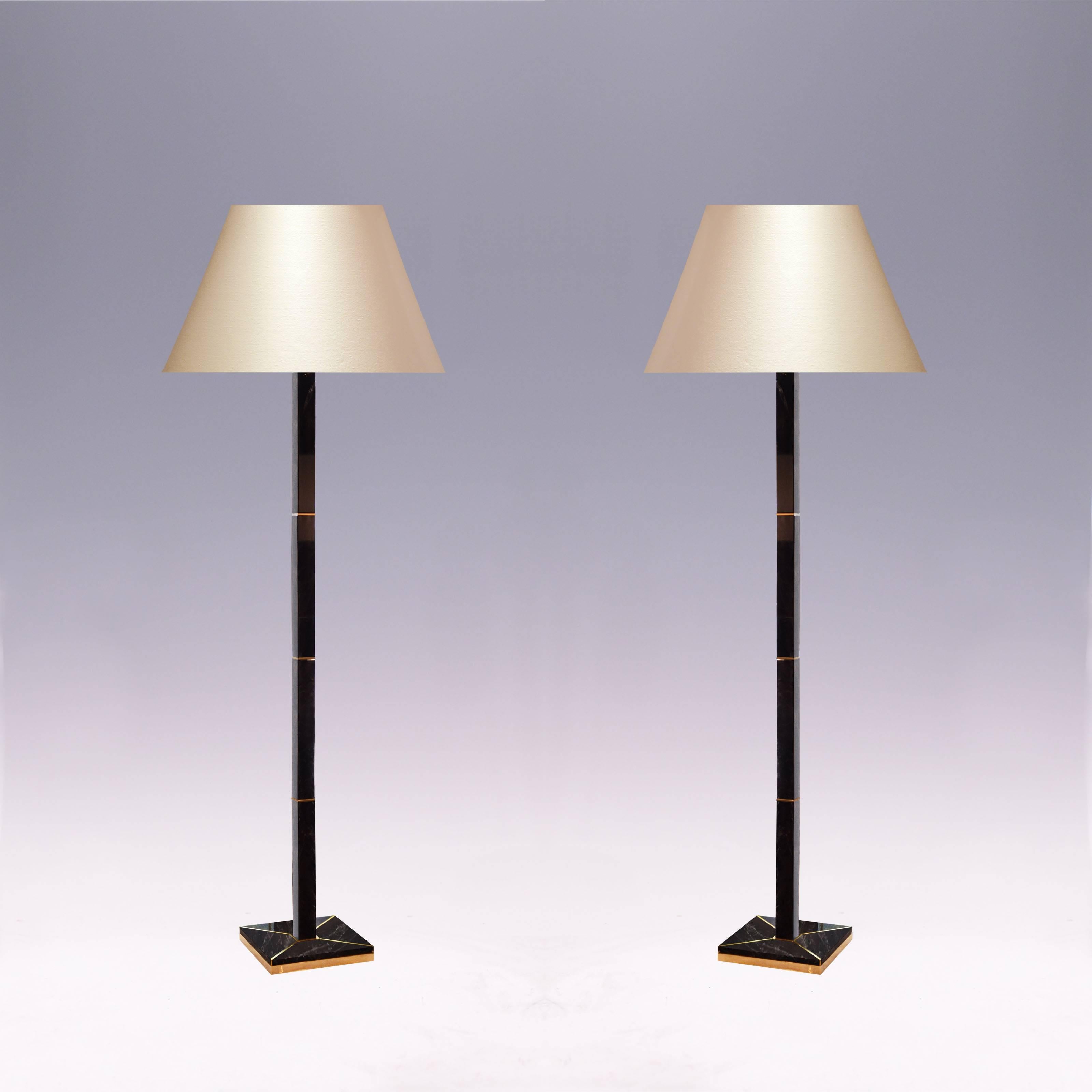 Pair of modern elegant dark brown rock crystal floor lamps with brass plating base, created by Phoenix Gallery, NYC.
Available in nickel plating metal finish.
(Lampshade not included). 
 