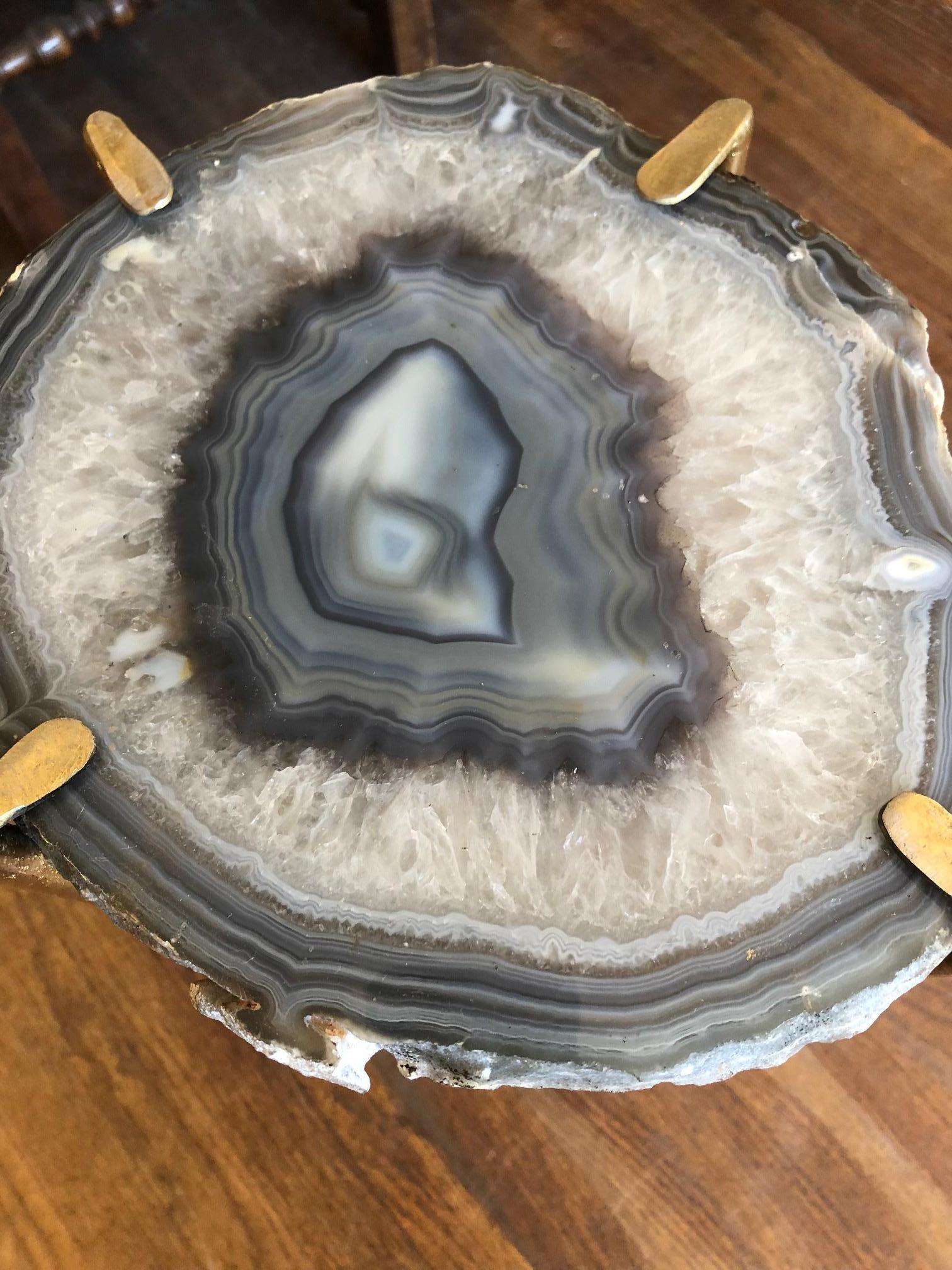 Unusual modern handcrafted drinks table. Large quartzite geode top with gilded steel base. Grey has a blue undertone when viewed in person.