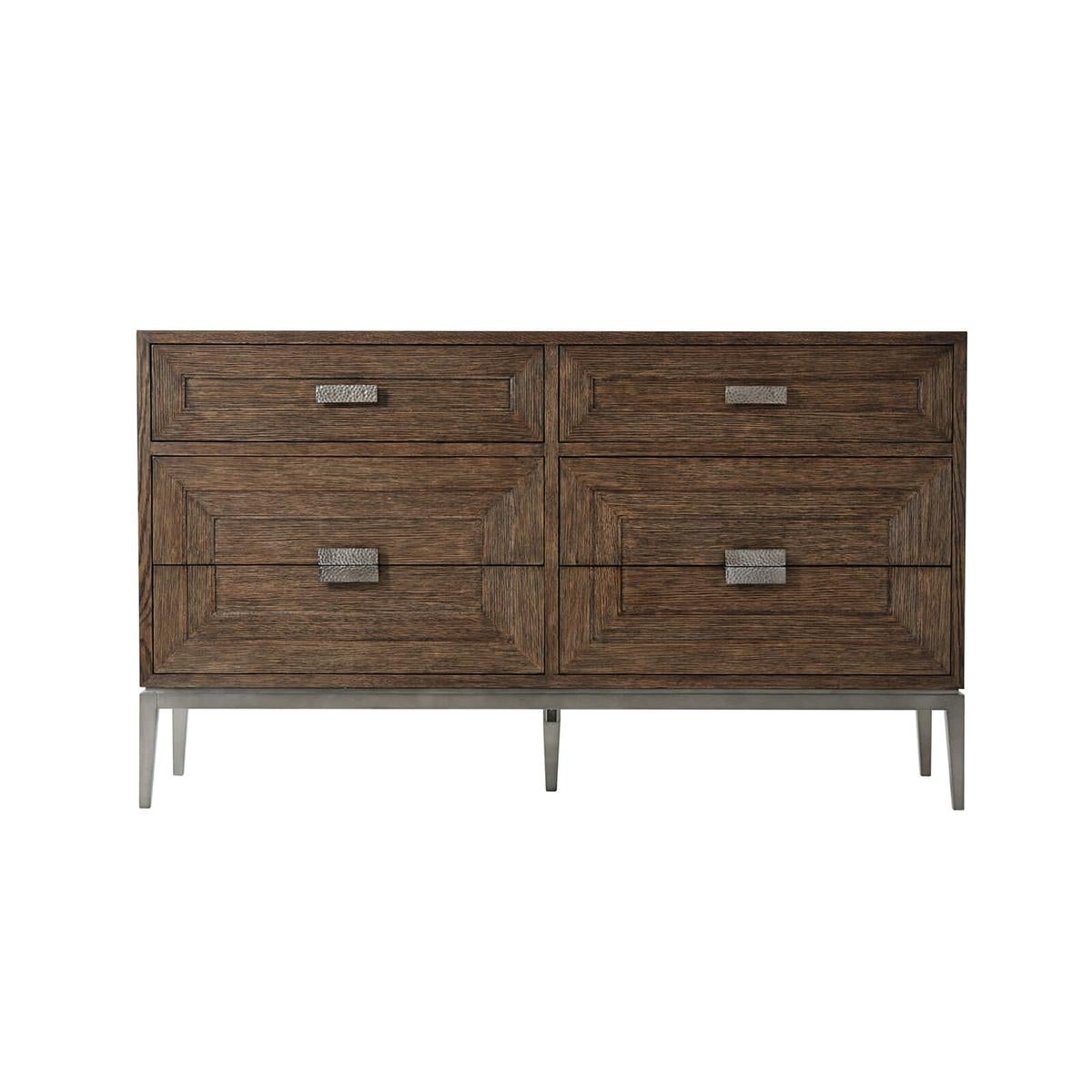 Modern dark oak dresser, a six-drawer chest of drawers in our dark brushed oak charteris finish with two frieze drawers above and four larger drawers below. Each with relief inlaid angular centric lines and hammered metal handles with matte tungsten