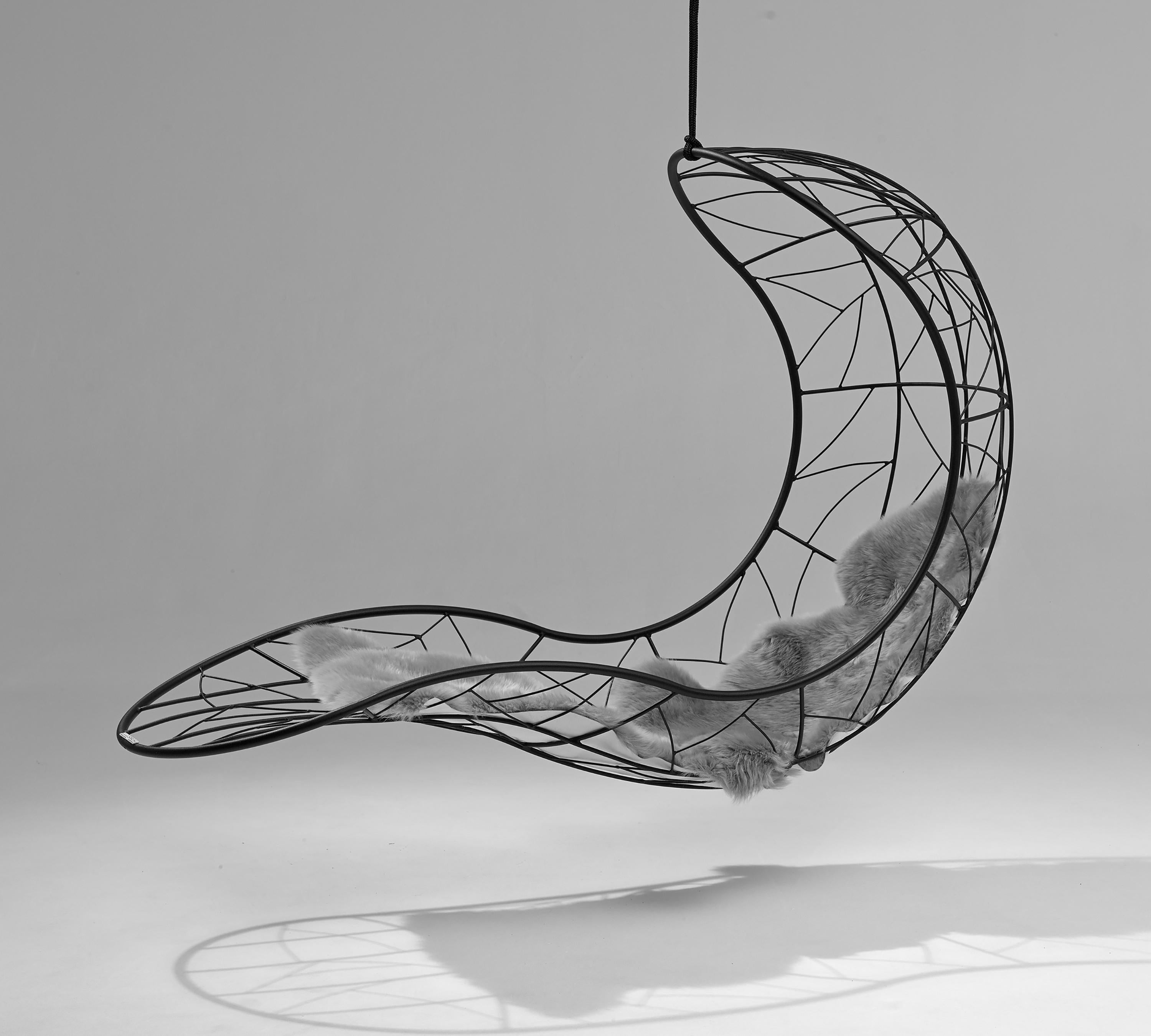 The Recliner hanging chair swing seat has elegantly curved lines & is sculptural and dynamic with a considered balance point.

Fluid & organic, it lends itself for use as a functional art piece. Its gentle movement gives a relaxing, floating