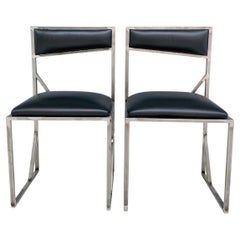 Collectible design black leather steel chairs by Roos Schneijderberg