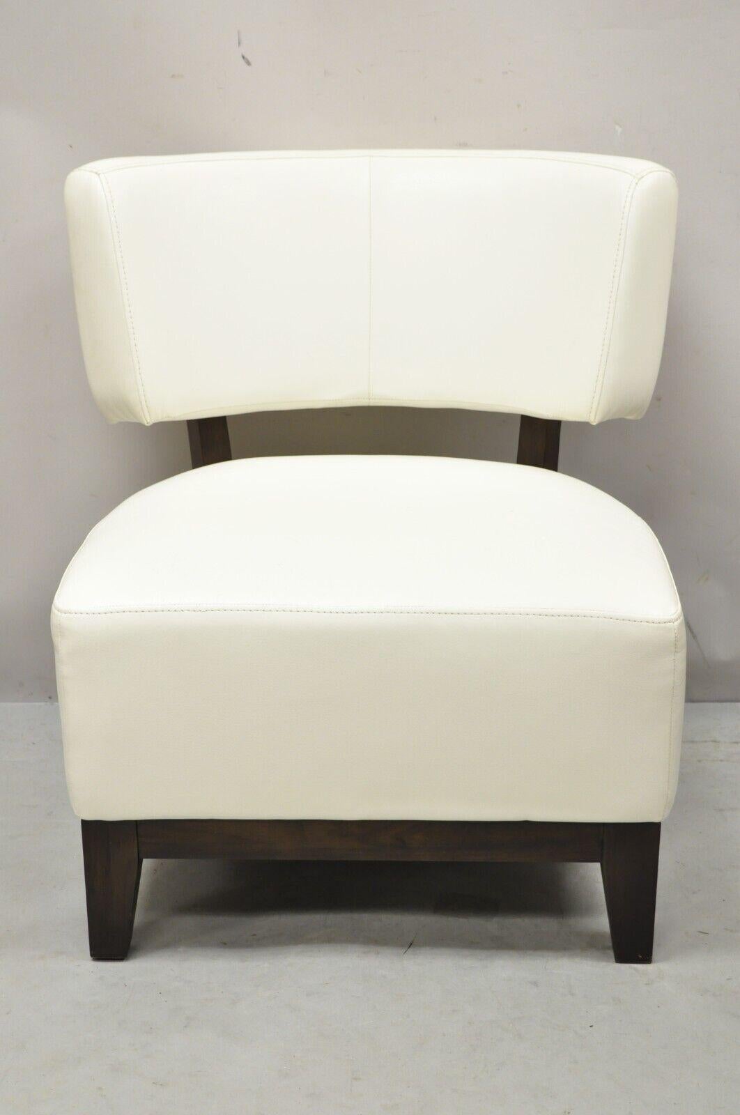 Modern decorator white vinyl barrel back club lounge slipper chair. Item features white vinyl upholstery, solid wood frame, clean modernist lines, great style and form. Circa Late 20th to Early 21st Century. Measurements: 30.5