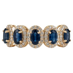 Modern Deep Blue Sapphire & Diamond Halo Half Eternity Ring in 14K Yellow Gold