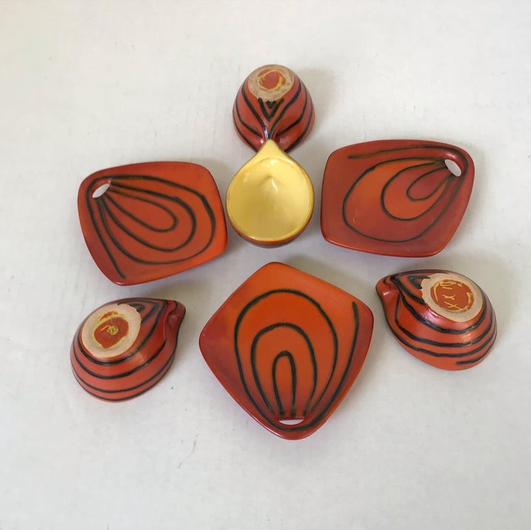 A set of Demi Tasse espresso cups and plates by Tofej Keramiazem Hungarian ceramic company from the 1960s. This hand painted set includes 3 cups (plus an extra one with small hairline) and 3 small cookies plates. All hand done and the influence of