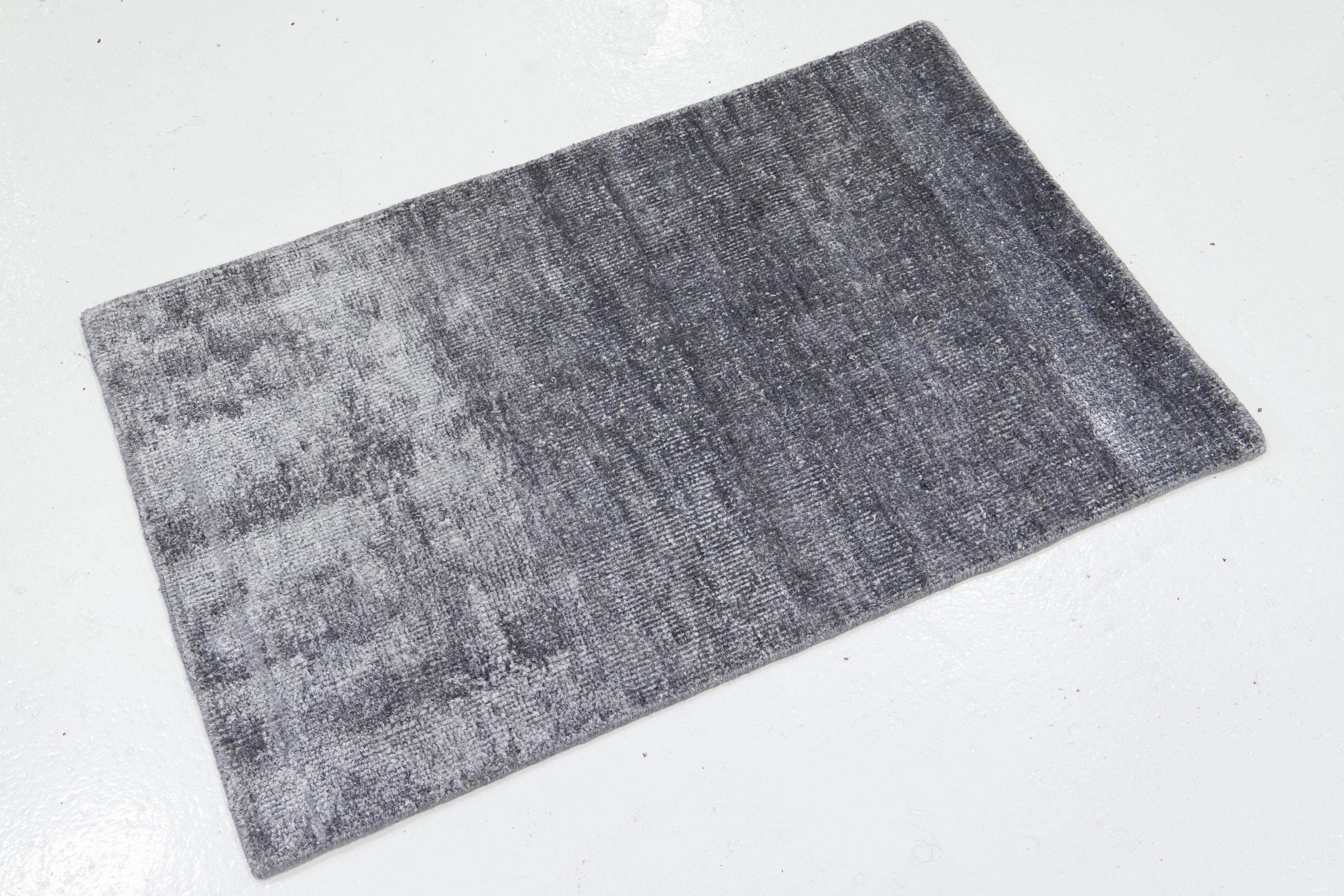This handcrafted custom silk rug, available in multiple colors, is part of our Desert Collection. We use hand-loomed techniques for superior quality and longevity. 
The estimated lead time for customs is 15-20 weeks.
Material: Silk
Techniques:
