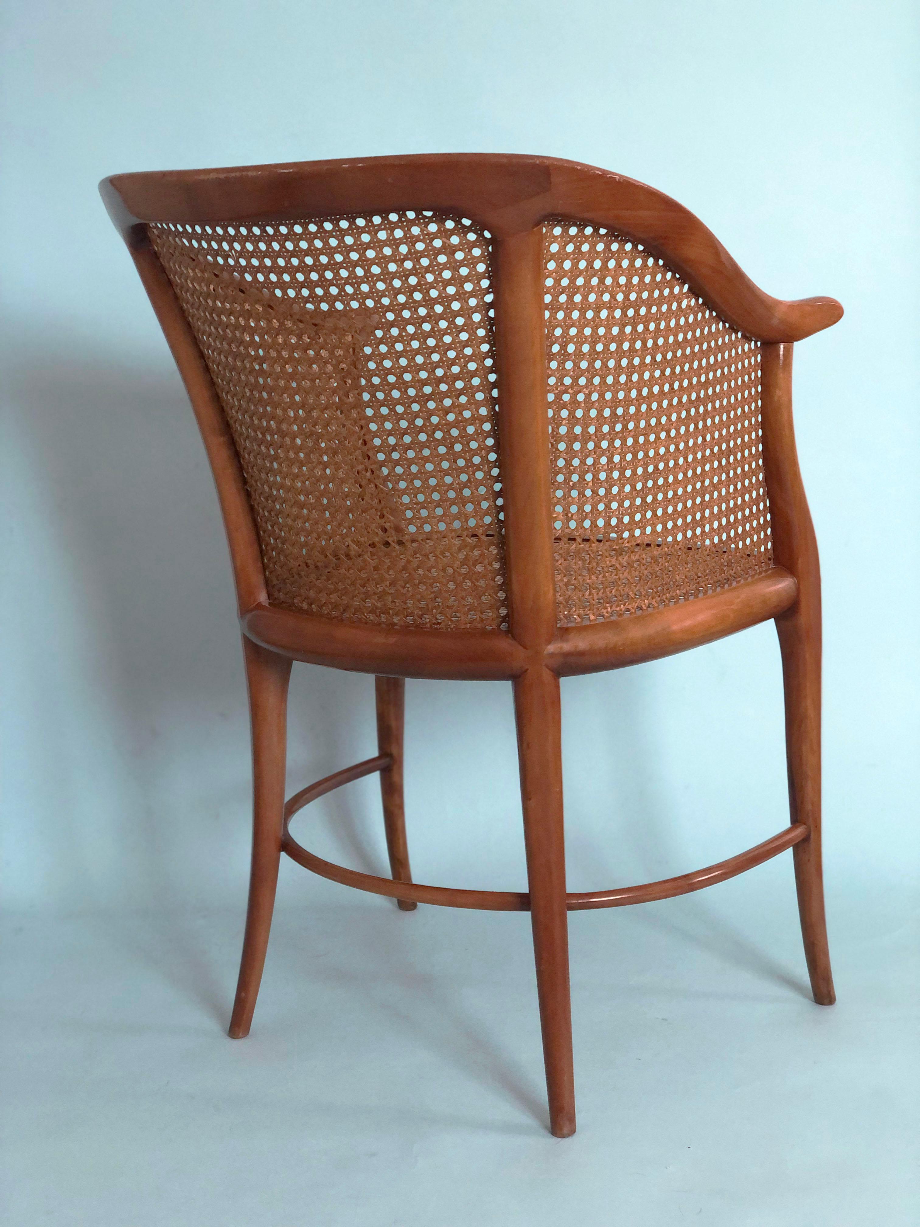 Annibale Colombo Design Chair. An unique and high-quality piece that effortlessly blends style and craftsmanship. Solid cherry wood and cane in very good condition.
This item is marked and registered by the manufacturer with the number