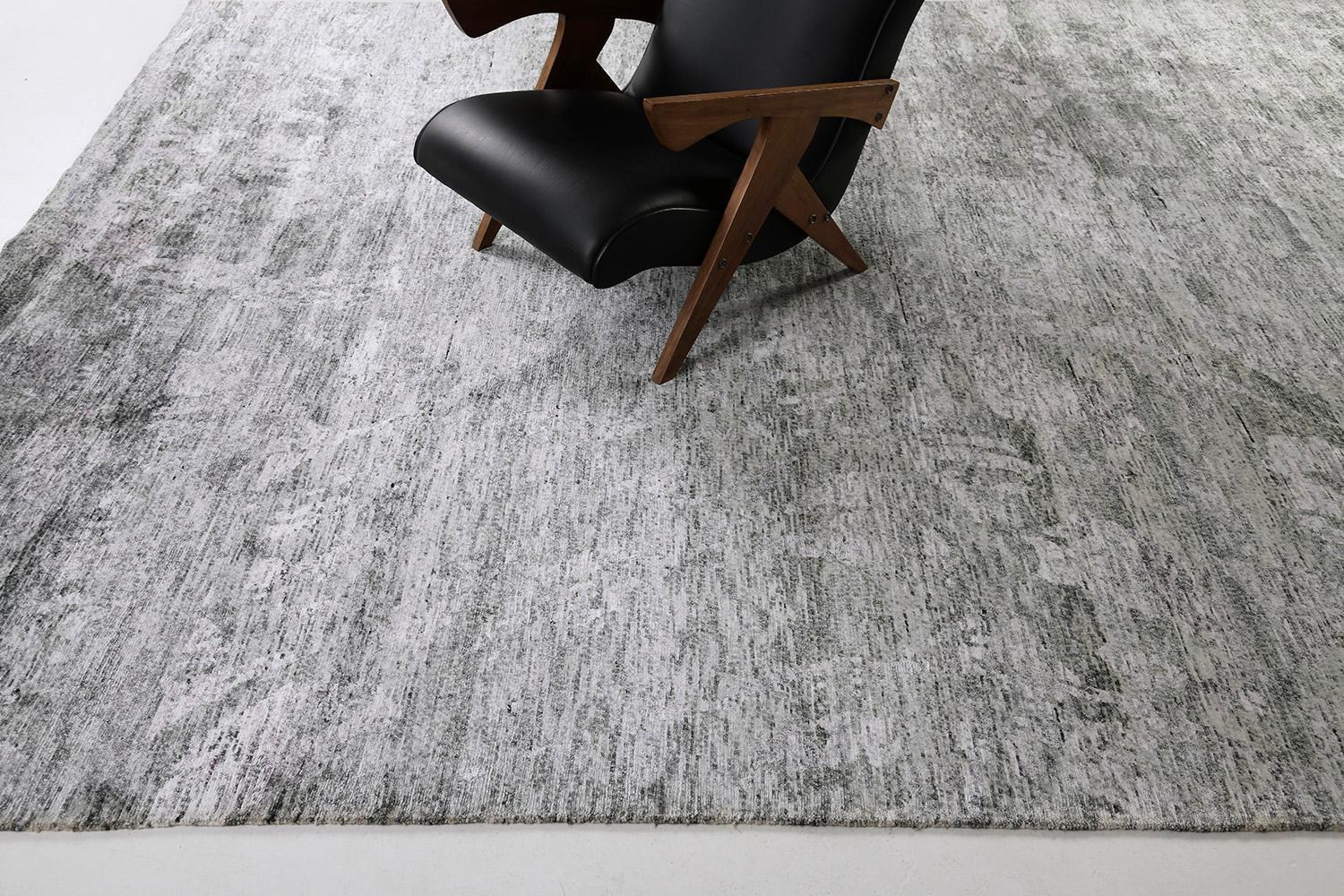 Fideli is a bamboo silk rug in a timeless blend of gray and white. Dramatic abstract waves of details make this modern rug more satisfactory to your spaces. Perfect for a home with a minimalist and contemporary kind of interior.

Rug Number