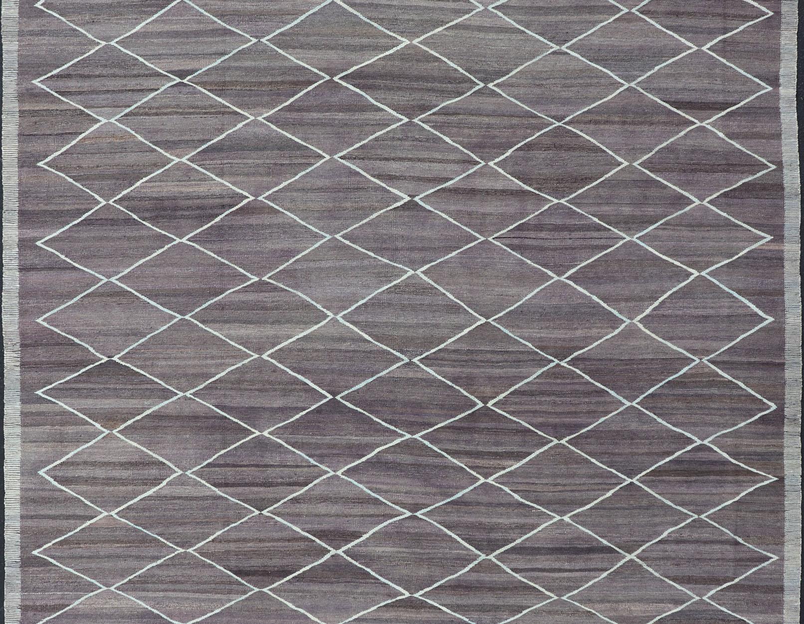 Large Modern flat-weave Fine Kilim rug in shades of dark purple, brown and light blue green highlights. rug AFG-27634, country of origin / type: Afghanistan / Kilim

This unique Kilim with a Minimalist design features a repeating diamond pattern,