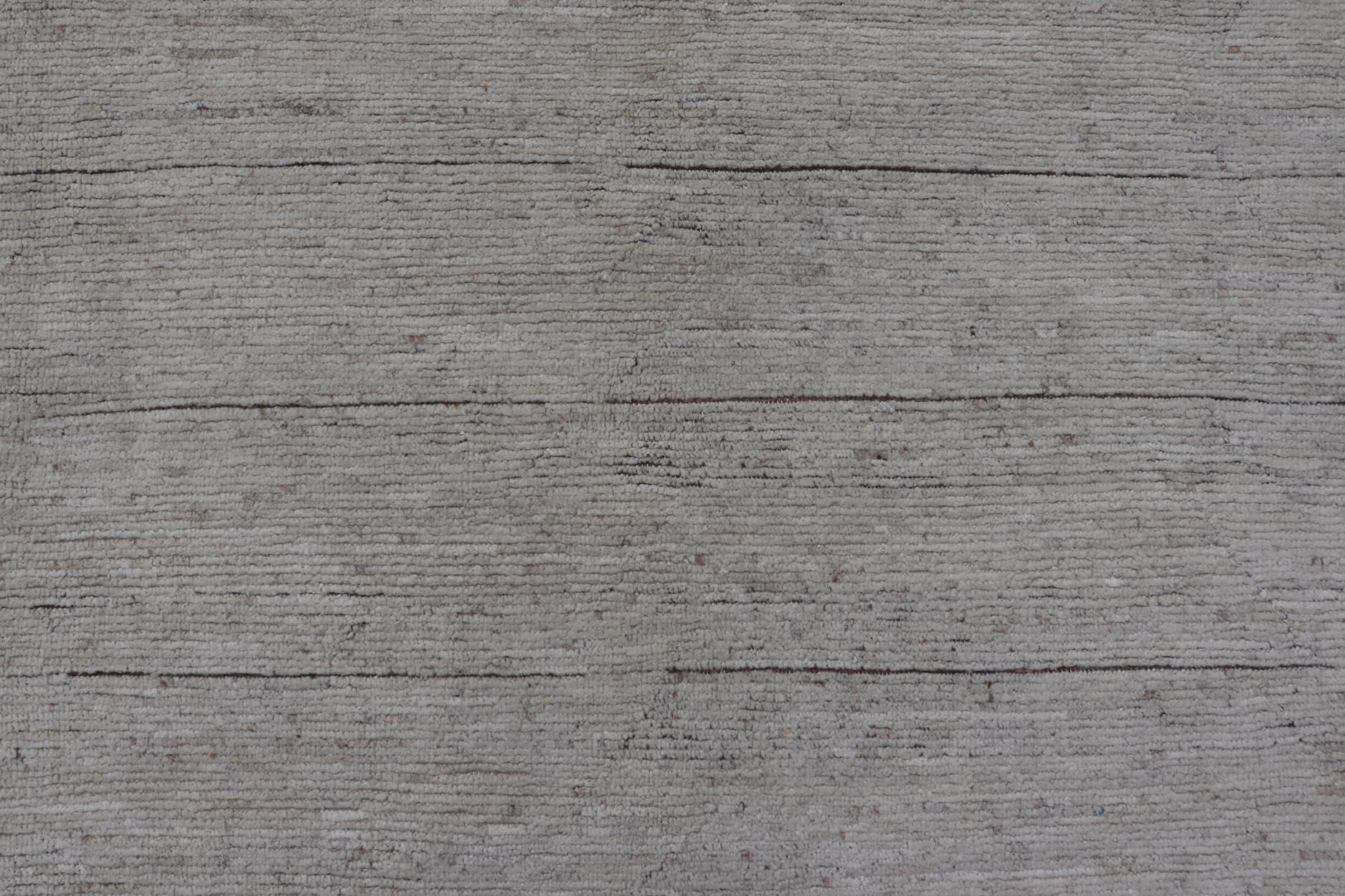 Modern Design hand knotted rug in Solid design with white / off white colors, solid design Modern rug for Modern Interiors. Modern Design rug with Brown Kilim. Minimalist Modern Rug with Subtle Horizontal Lines Rug by Keivan Woven Arts. Keivan Woven