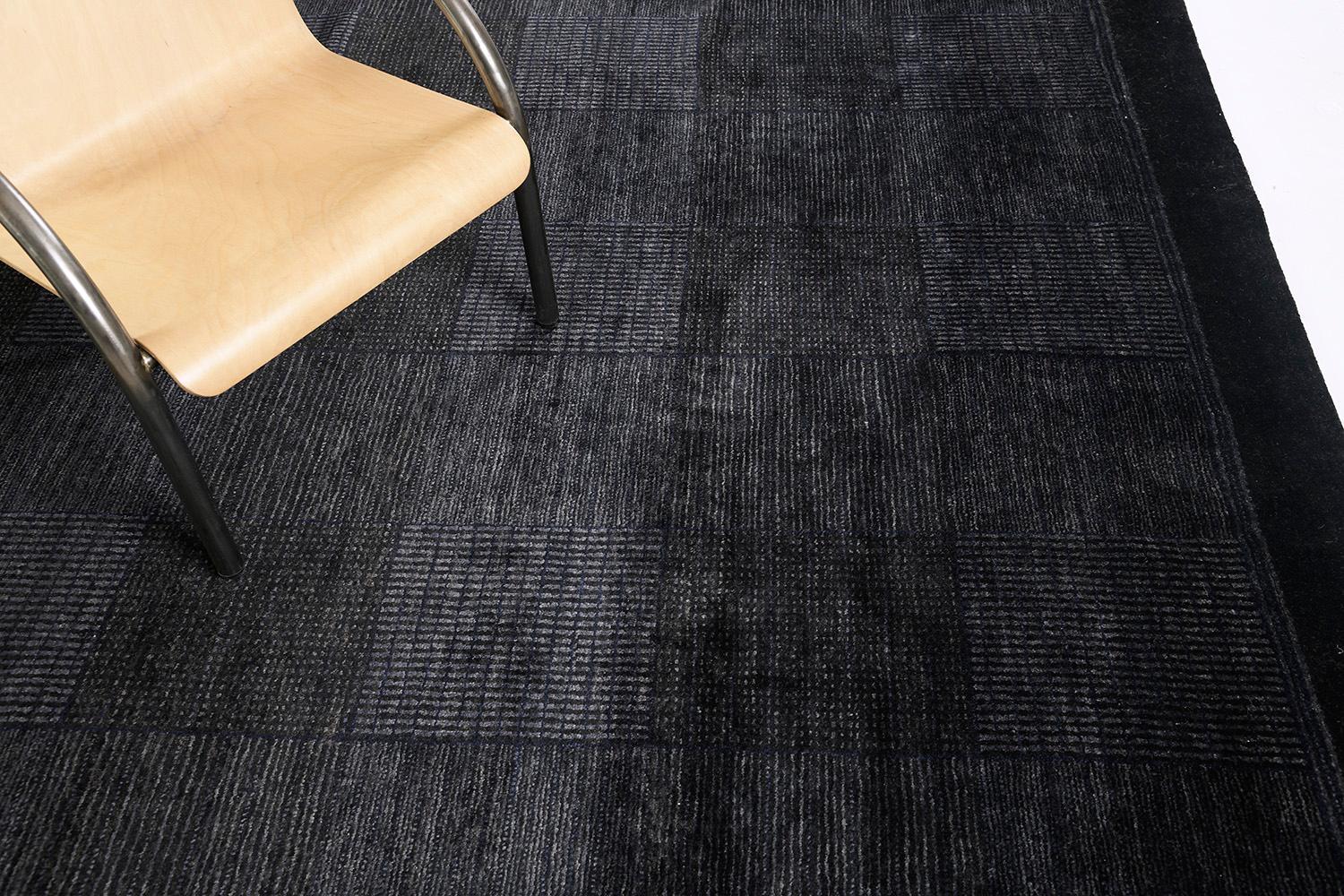 The interweaving design of intense blues and charcoal creates the emergence of majestic checkered patterns. The lustrous wool and silks bring movement to the rug especially when light refracts throughout the day.


Rug Number 21668
Size 9' 1