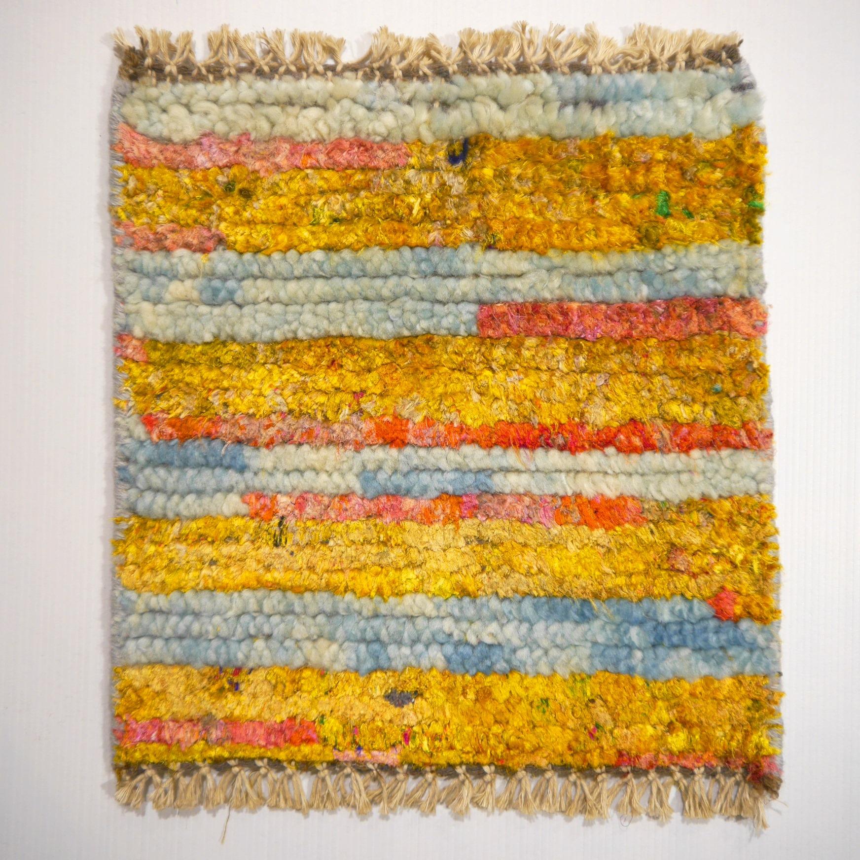 A beautiful contemporary design carpet, hand knotted using Sari silk (60%) and wool (40%).

Collection: 