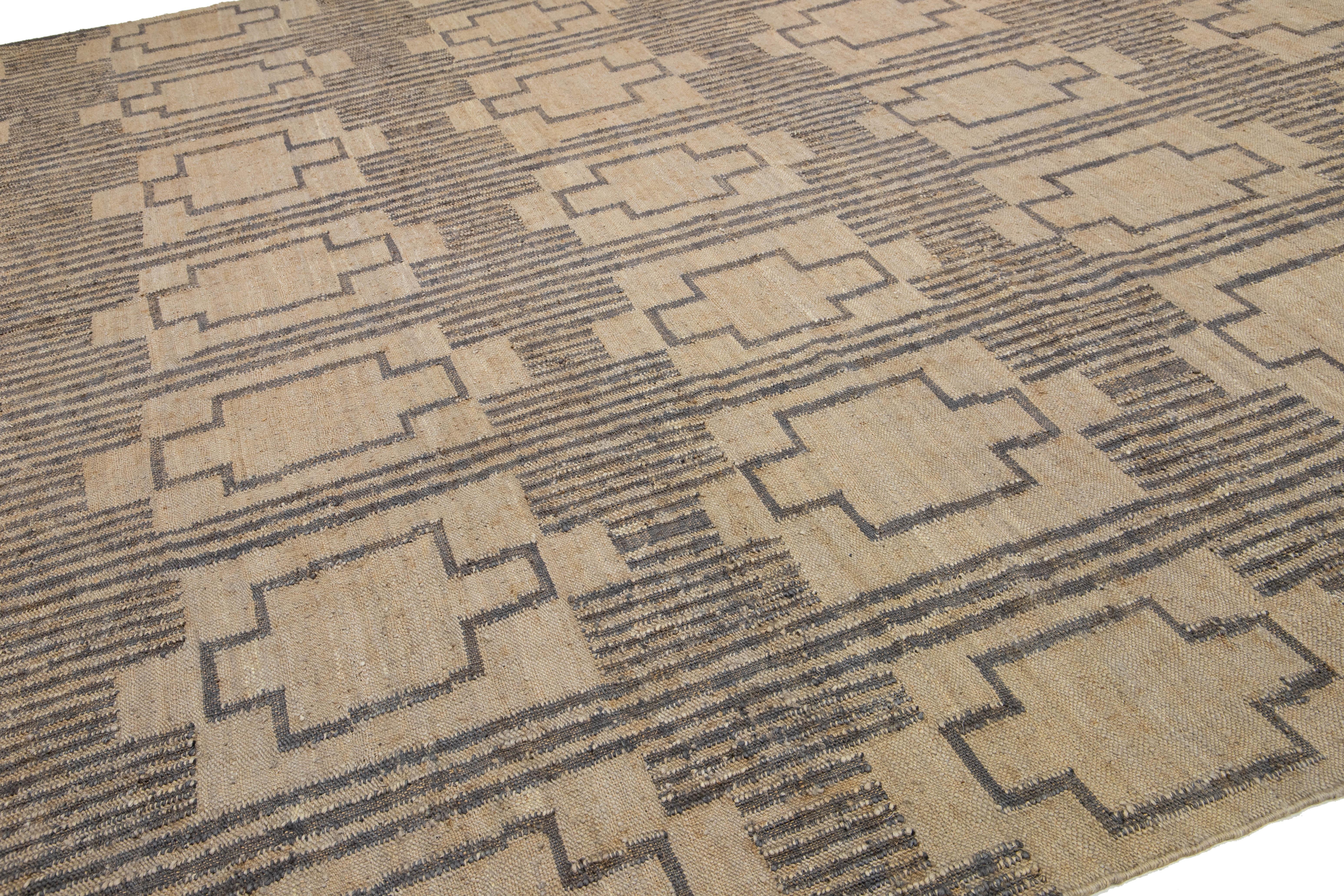 Hand-Woven Modern Dhurrie Handcrafted Natural Jute Rug In Tan For Sale