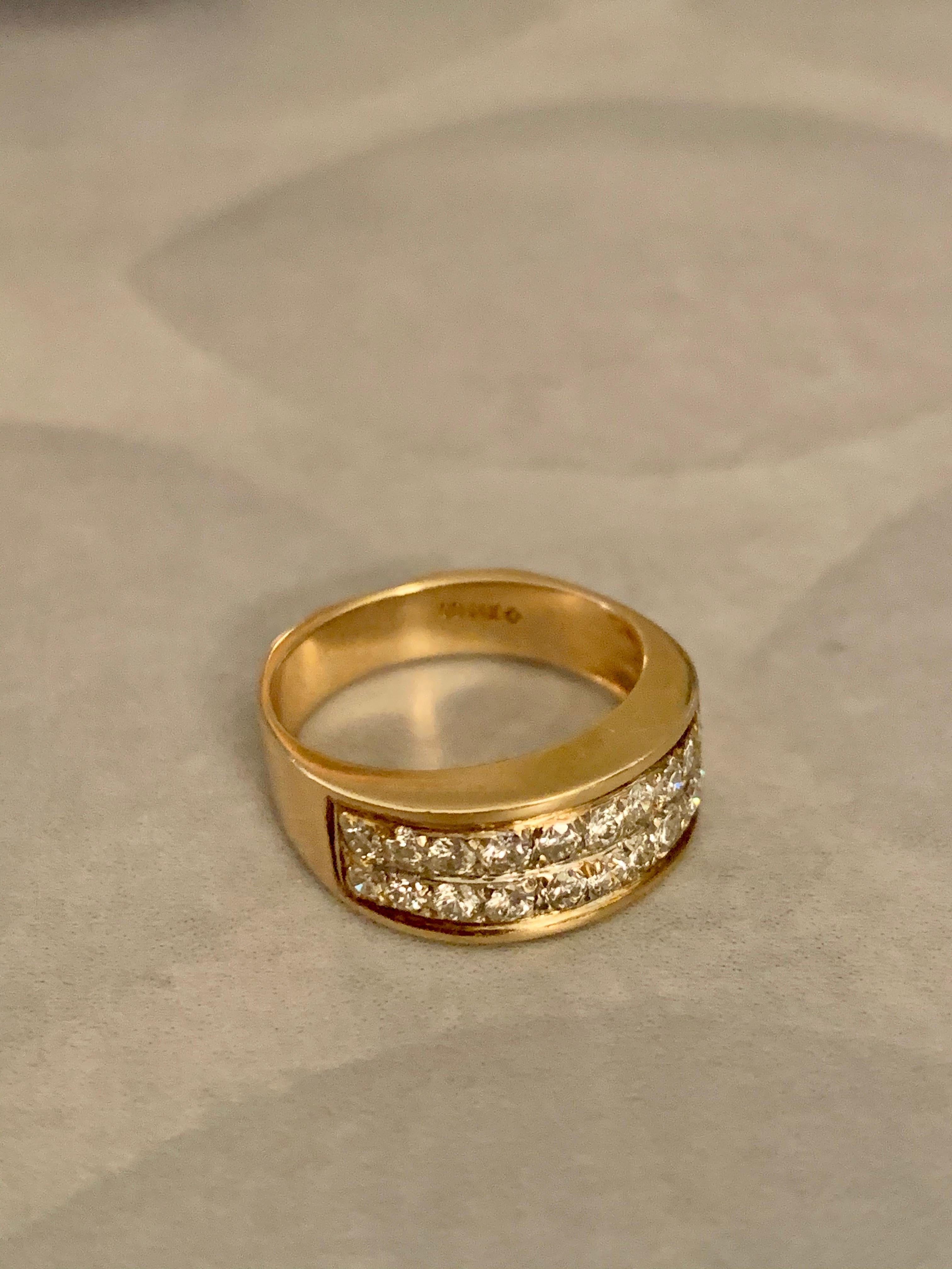 This modern Diamond ring features two rows of Diamonds; each row with ten Diamonds with an approximate 2.0ctw.

Size: 6 1/2 - this ring is resizable but vendor does not offer sizing services. 
Weight: 5.0 grams