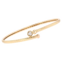Modern Diamond 18 Karat Yellow Gold Twisted Bangle Bracelet