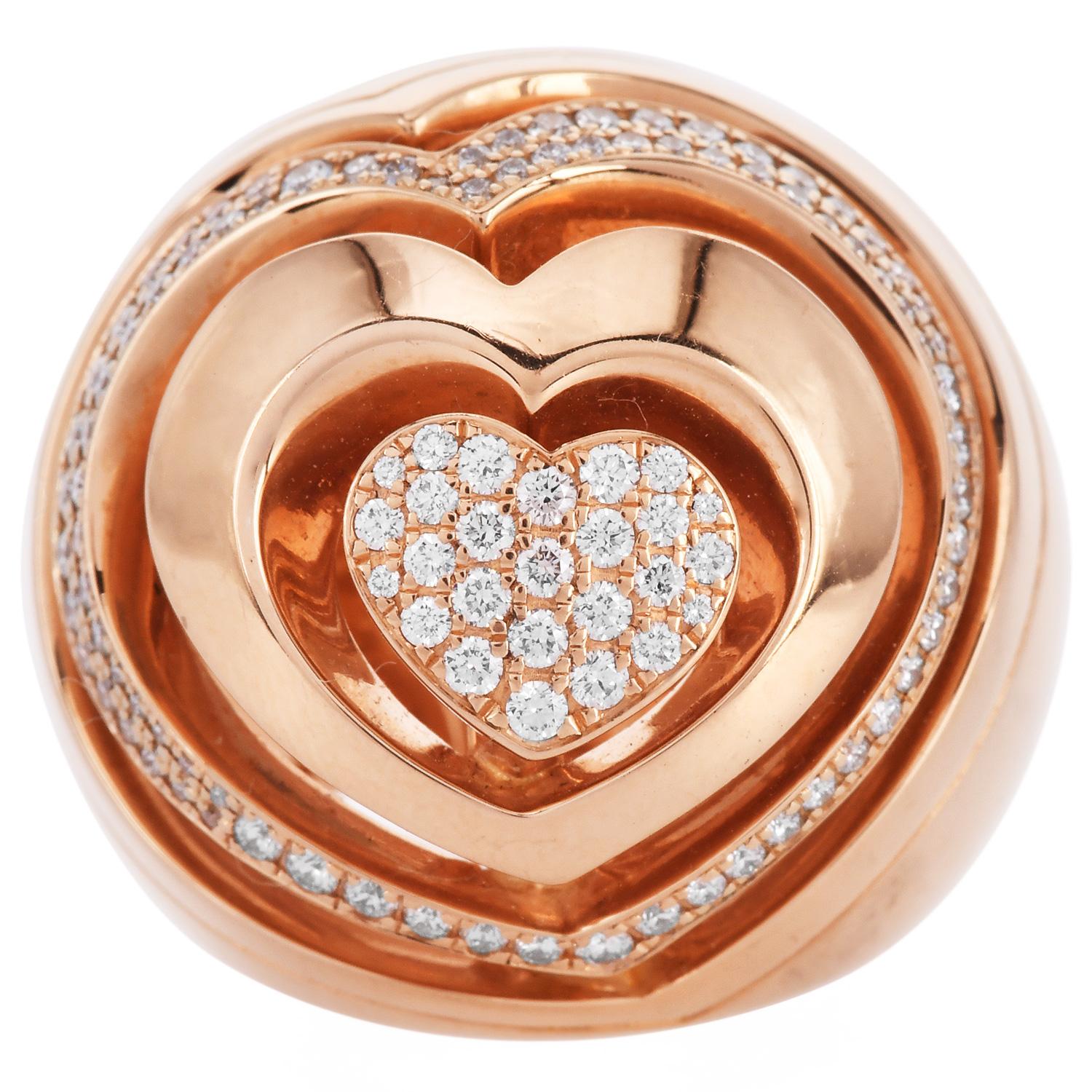 Estate Diamond 18K Gold Abstract Heart Dome Cocktail Ring forged in 18K rose gold with abstract heart illustration dome statement ring with natural Pave diamonds.

The diamonds are approx. 1.30  carats, E-F color and VS1-VS2 clarity

Marked:
