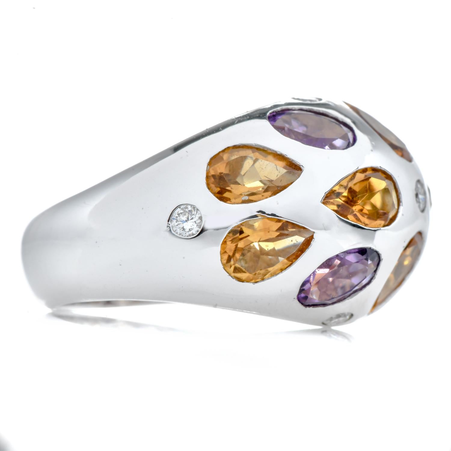 A Dome style Diamond Citrine Amethyst 18K White Gold Flower Dome Ring

This stunning ring is finely crafted in solid 18K White Gold. 

Displaying in (7) Round Cut, Genuine Daimond, flush set, collectively weighing 0.22 carats, G-H color, VS
