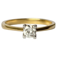 Bague solitaire moderne en or 18 carats et diamant