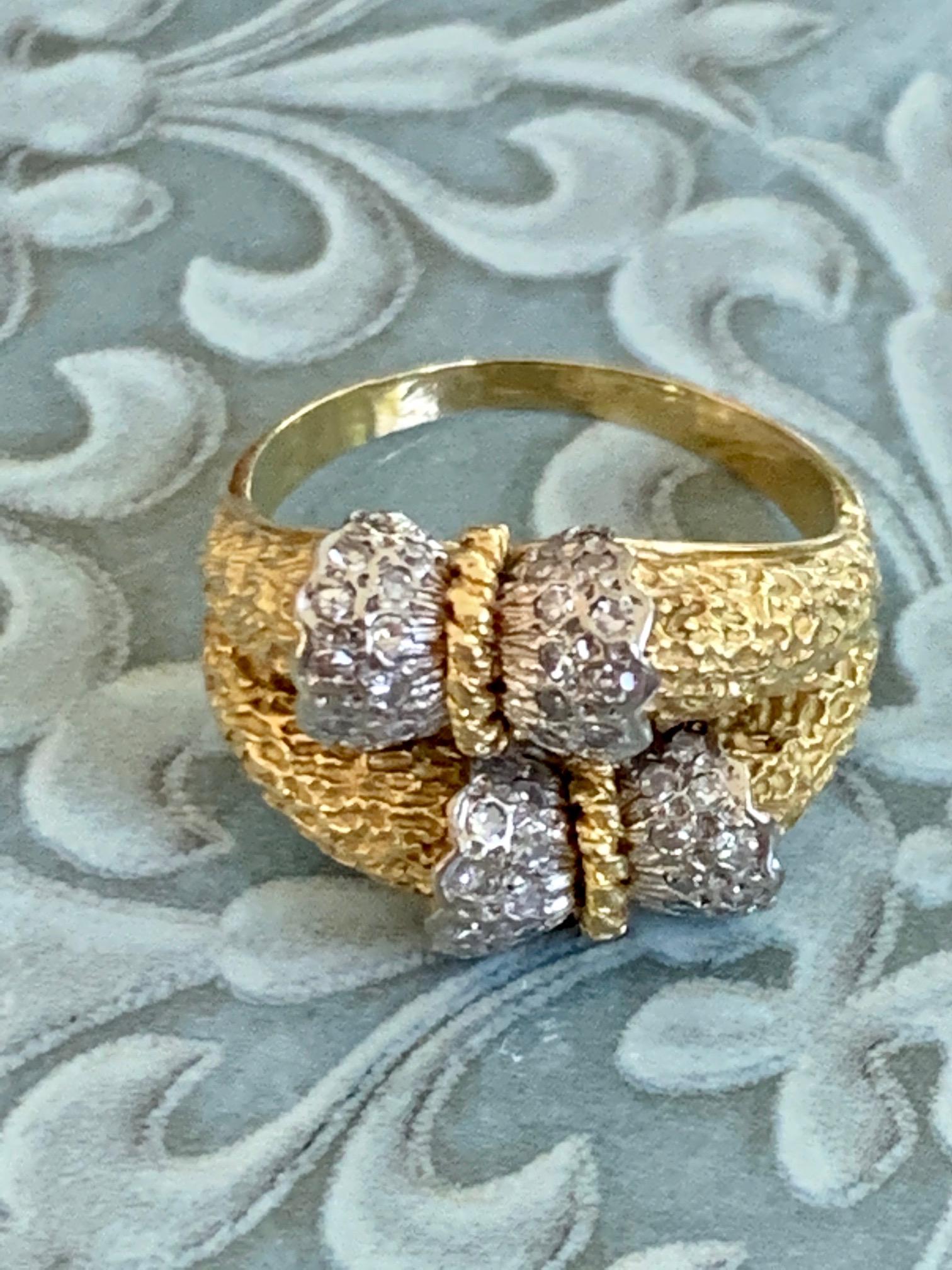 This fabulous modern 18 karat white and yellow Gold Diamond ring looks like it is wrapped around your finger when worn!  
It comes to you from the 1960's-1970's era.
There is no stamp or maker's mark.
The ring features:
48 single cut Diamonds!! 