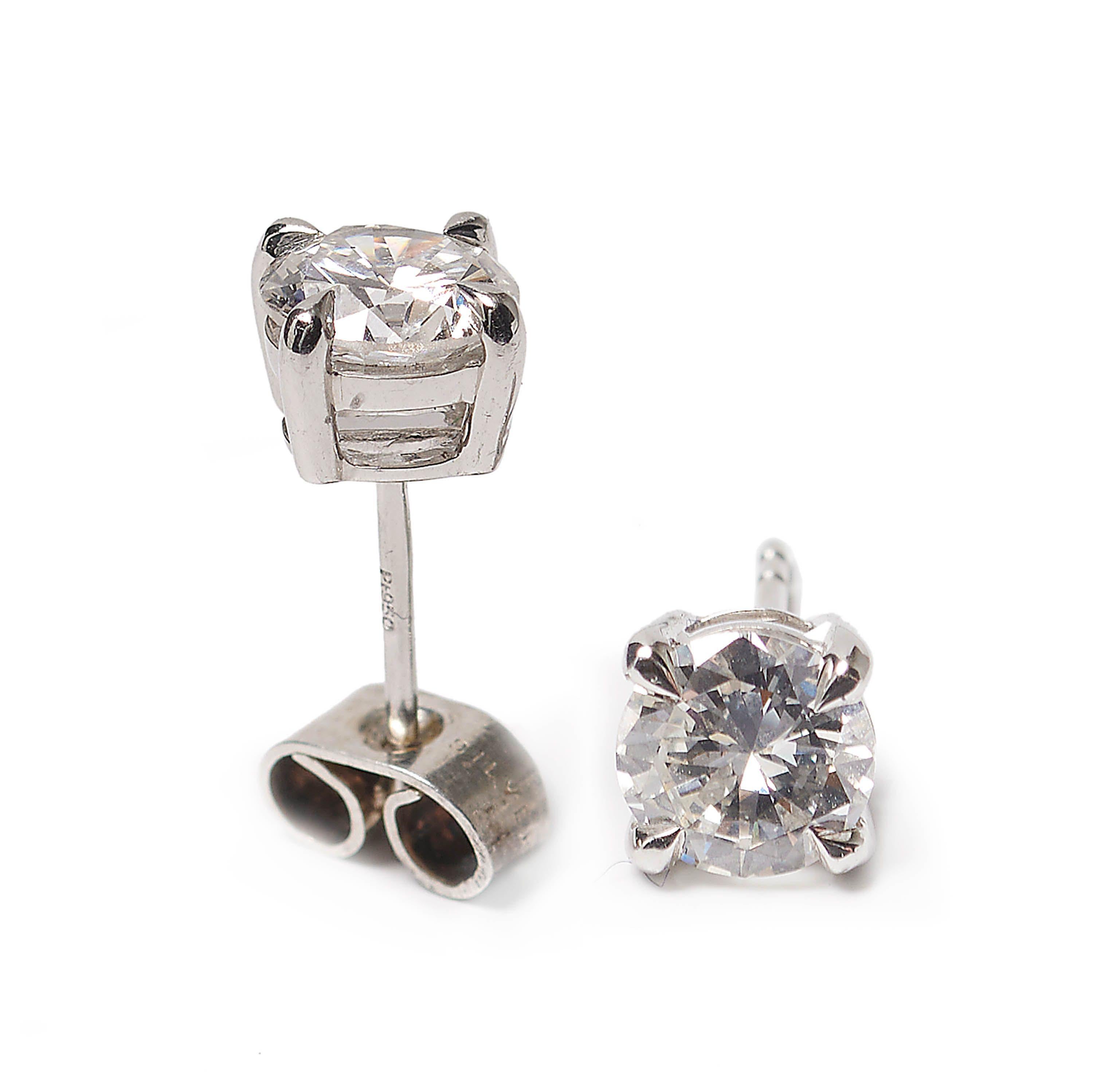 Brilliant Cut Modern Diamond and Platinum Four Claw Stud Earrings,  2.11 Carats For Sale