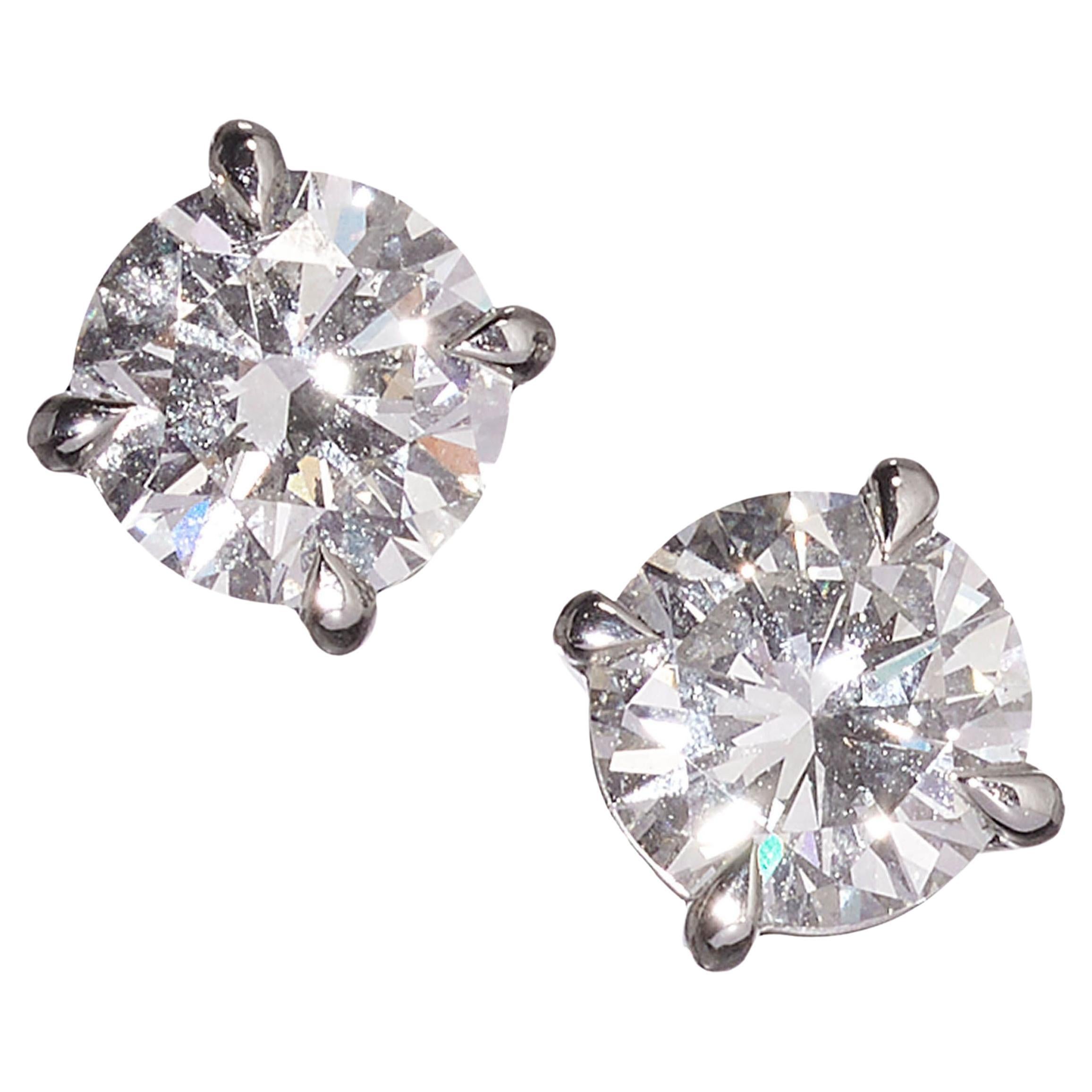 Modern Diamond and Platinum Four Claw Stud Earrings,  2.11 Carats For Sale