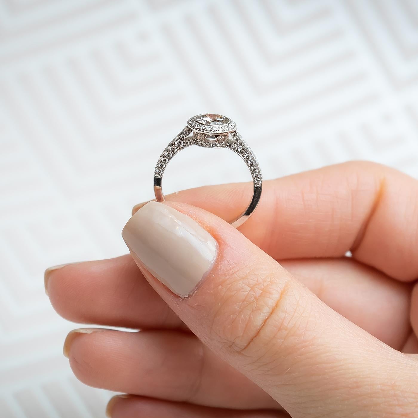 Modern Diamond and Platinum Micro Pavé Halo Ring, 0.85 Carats In Excellent Condition For Sale In London, GB
