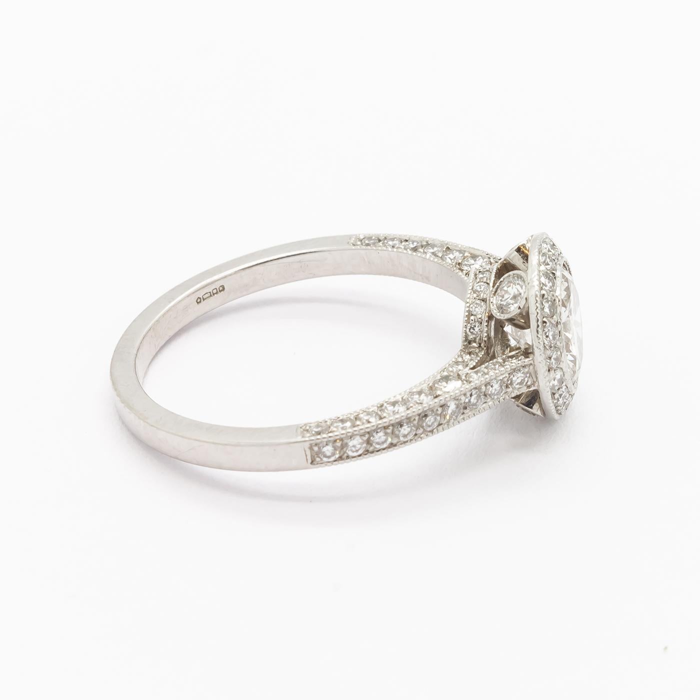 Modern Diamond and Platinum Micro Pavé Halo Ring, 0.85 Carats For Sale 1