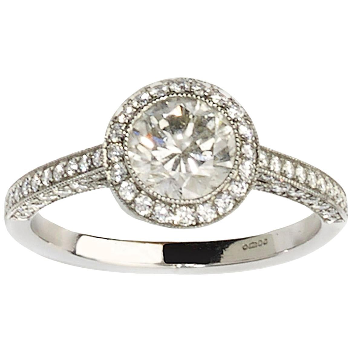 Modern Diamond and Platinum Micro Pavé Halo Ring, 0.94 Carats en vente