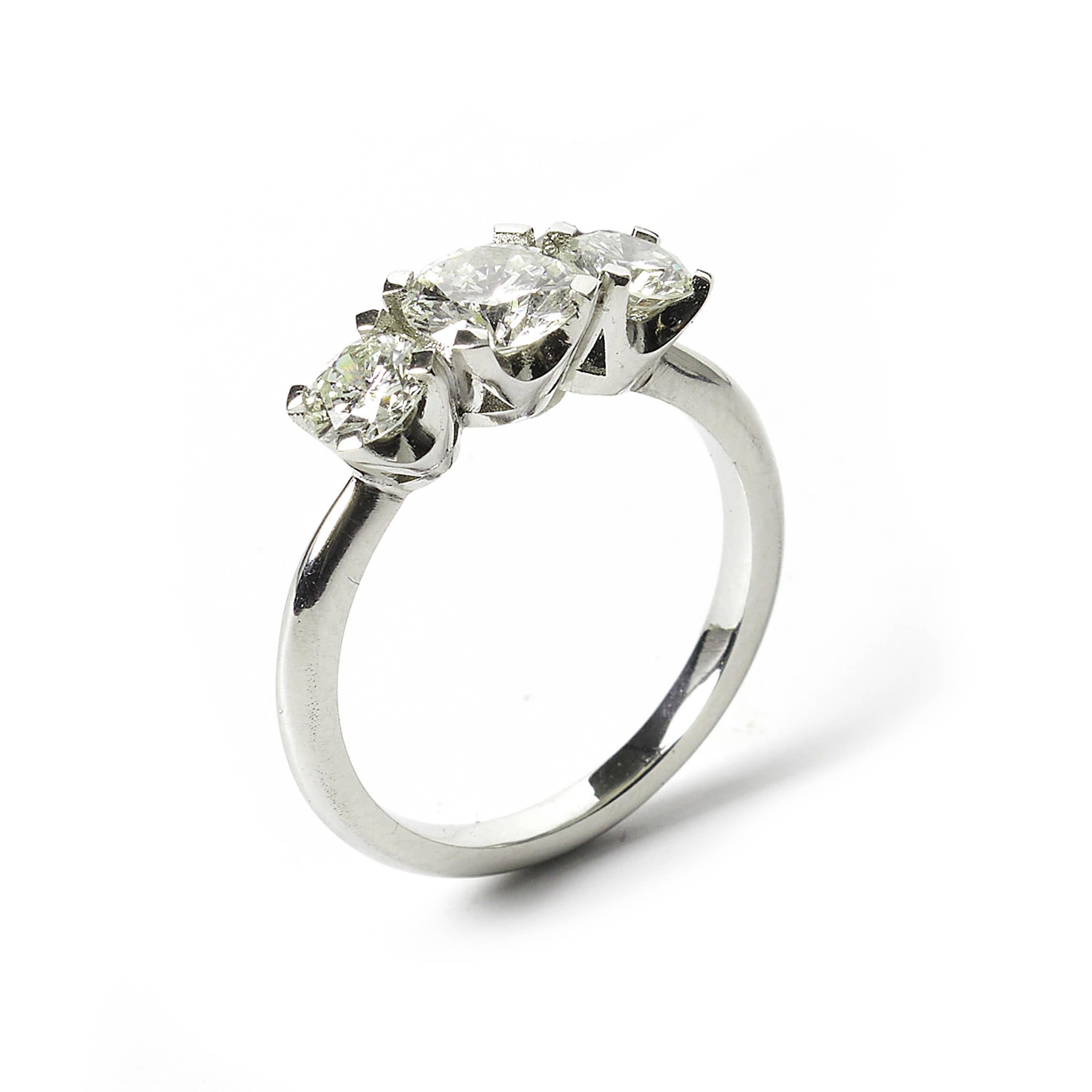 Brilliant Cut Modern Diamond and Platinum Three Stone Ring, 1.55ct For Sale