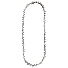 Collier de tennis moderne en or avec lunette en diamants