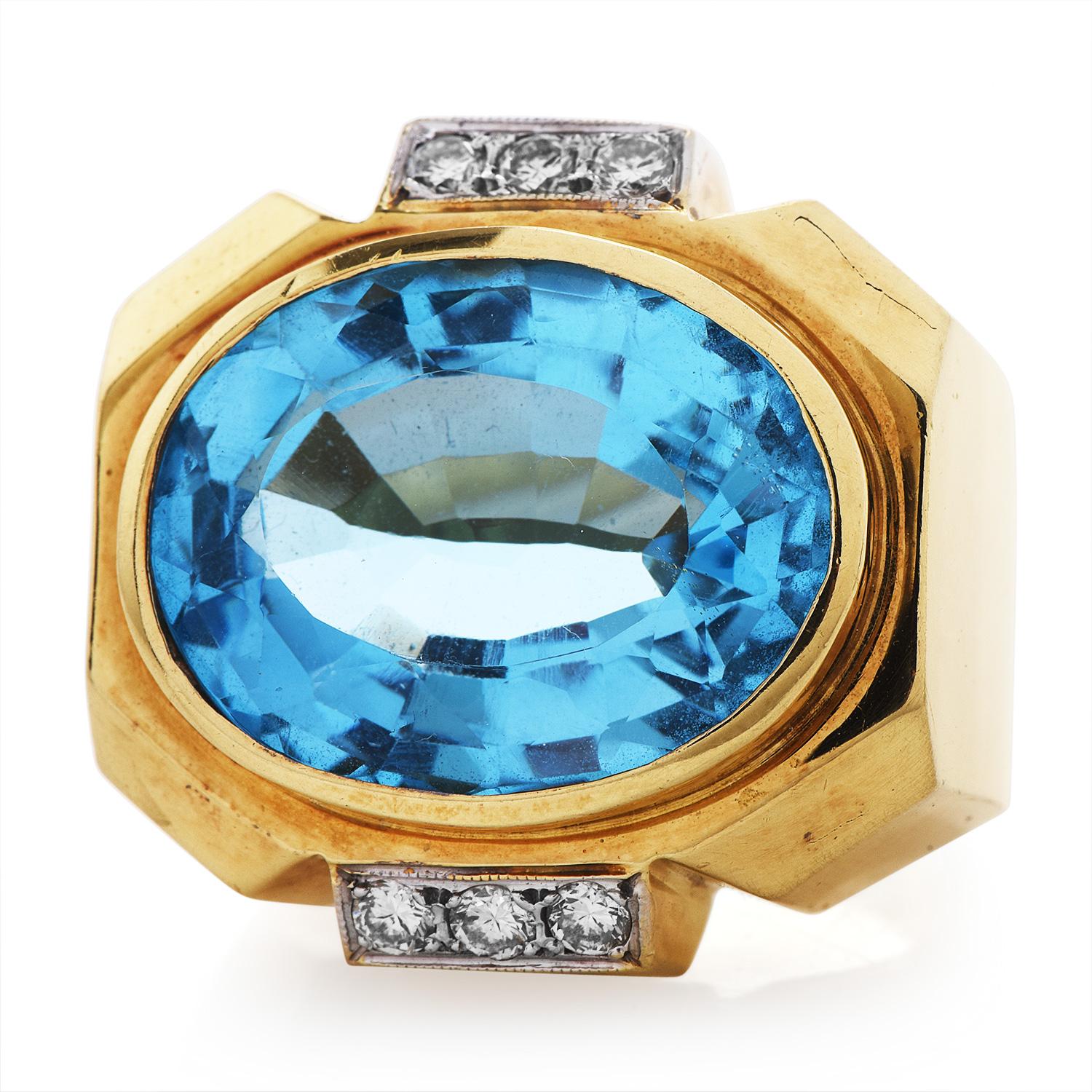 A retro and geometric piece with style and bold looks.

This 1980s cocktail ring was finely crafted in solid 14K Yellow Gold.

This exquisite piece has a Blue Topaz in the center, measuring 20.25 mm x 15.30 mm x 8.97 mm

Adorning the piece are