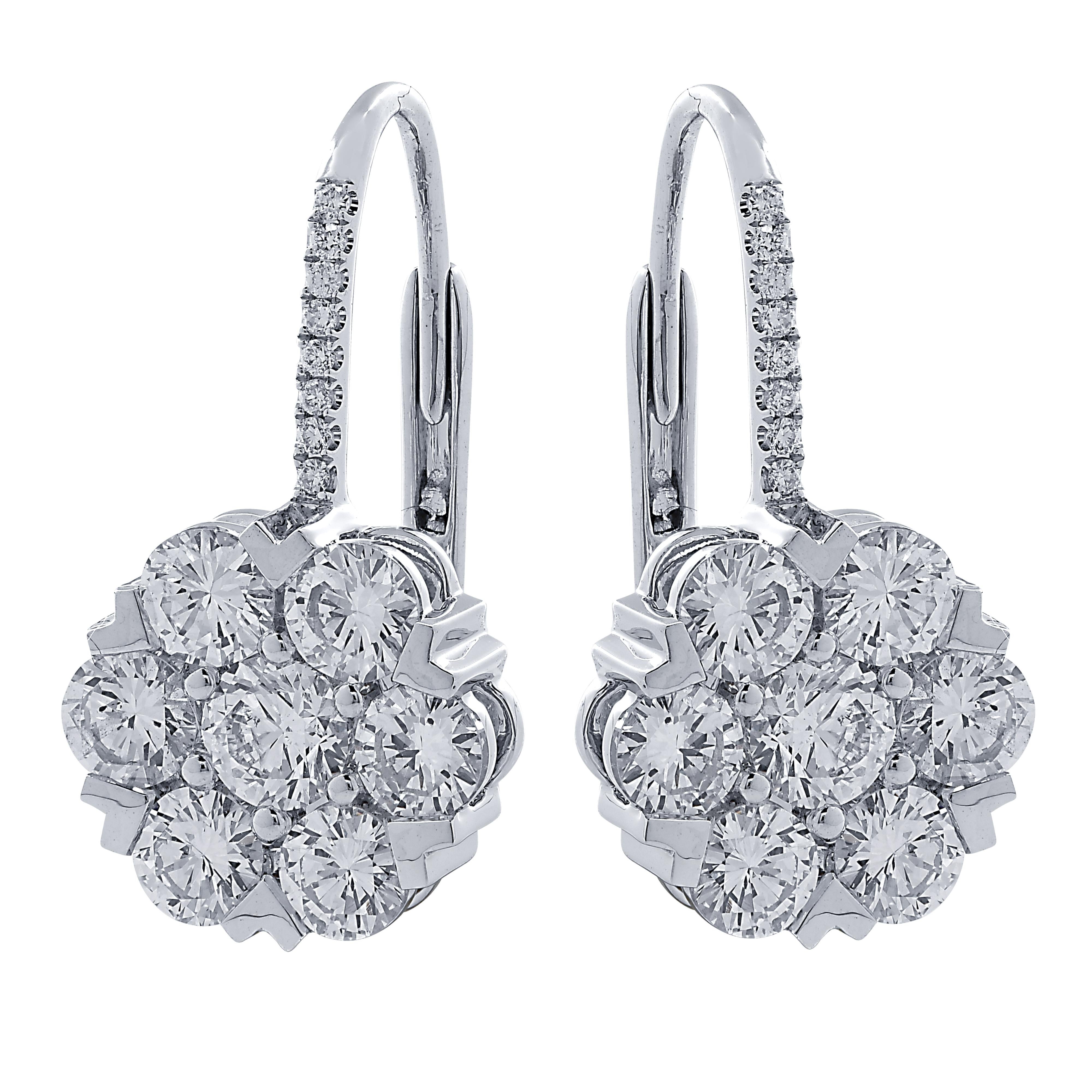 Stunning diamond dangle earrings crafted in 18 karat white gold. The drops feature 30 round brilliant cut diamonds weighing approximately  2.87 carat total weight. The diamonds are graded G color and VS-SI clarity and are arranged in a floral