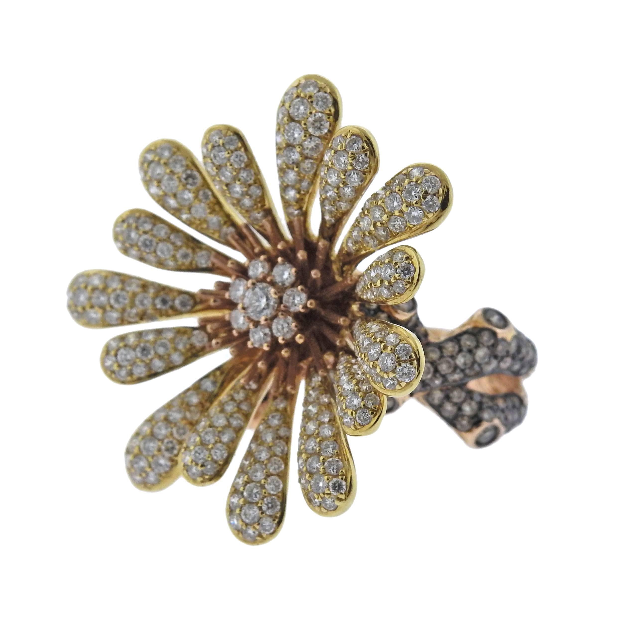 Large modern 18k gold flower ring, featuring a total of 2.87ctw in GH/VS diamonds. Ring size - 5.5, ring top - 30mm x 31mm, weighs 13.3 grams. Marked: 750 and D287.