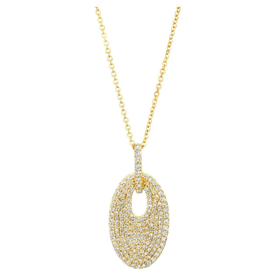 Modern Diamond Pave Oval Disc Pendant in 14 karat Yellow Gold With .60 Carat For Sale