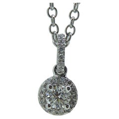 Modern Diamond Pendant with Diamond Halo Surround in White Gold Modern Diamond Pendant with Diamond Halo Surround in White Gold